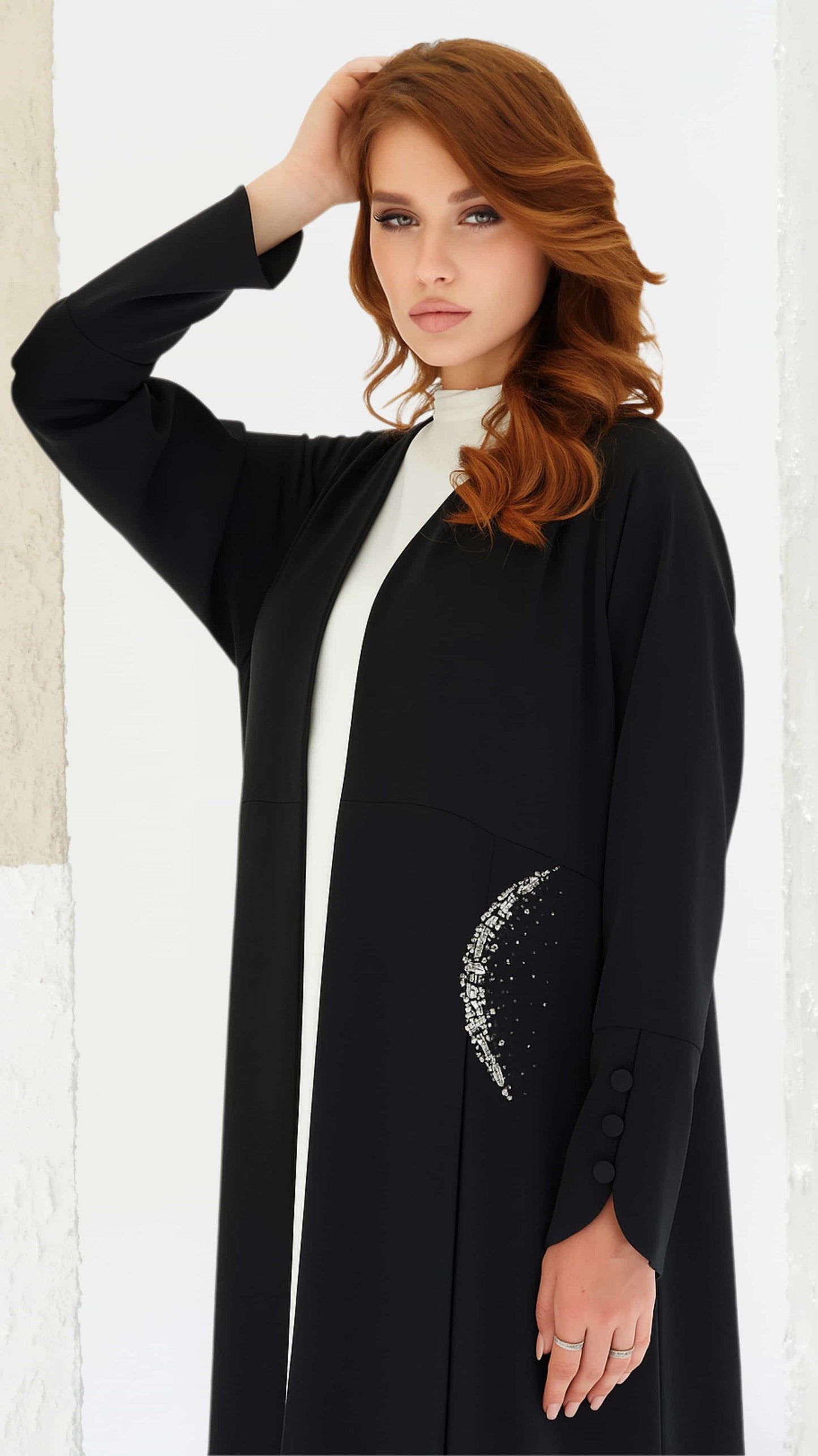 KAINA Noir Éclat black luxury crystal abaya side pose in Dubai by Diva Atelier