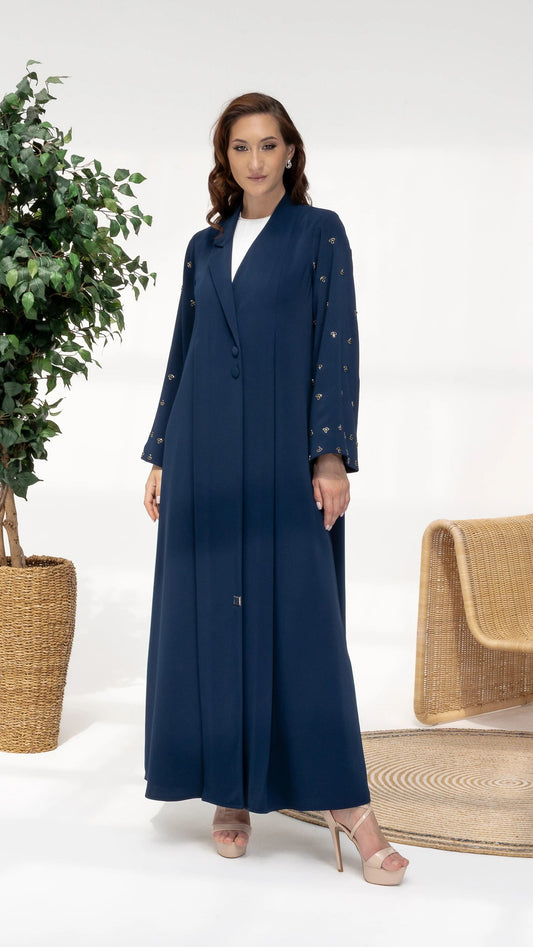 NUJUMA Midnight Luxe Abaya luxury navy abaya with gold constellation embellishments full-length portrait