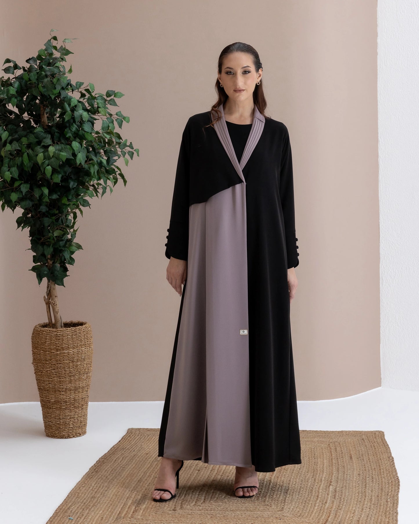 RAWAN Taupe Noir elegant two-tone abaya featuring fluid draping and minimalist couture styling