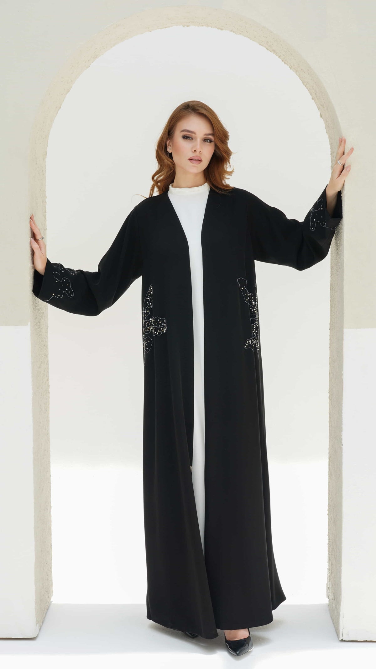 Aziza Noir Fleur black luxury abaya with silver floral beadwork on sleeves