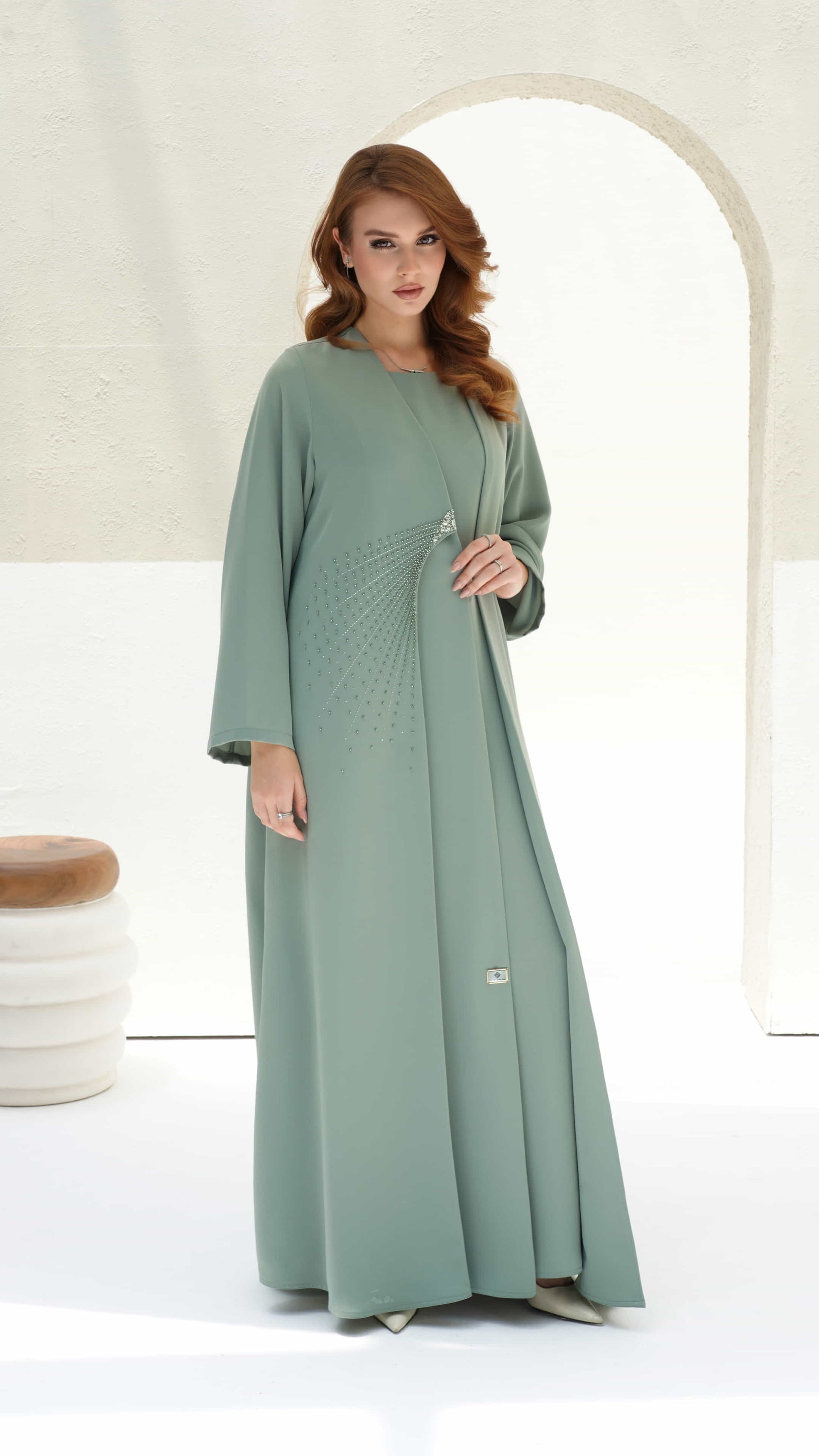 BAHIA | Sage Radiance Flowing sage green abaya with modern minimal silhouette
