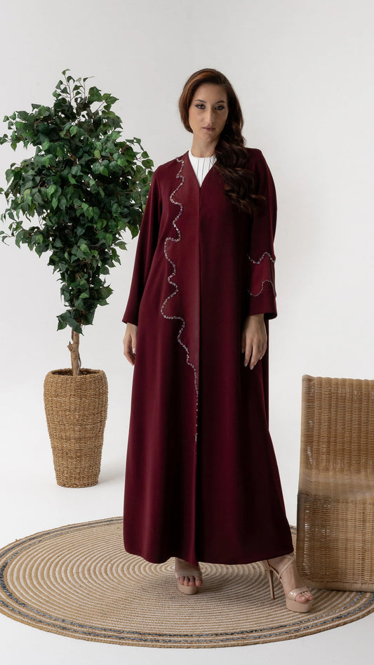 BARIQAH Mulberry Luxe luxury burgundy abaya with crystal wave embellishment and flowing silhouette by Diva Atelier