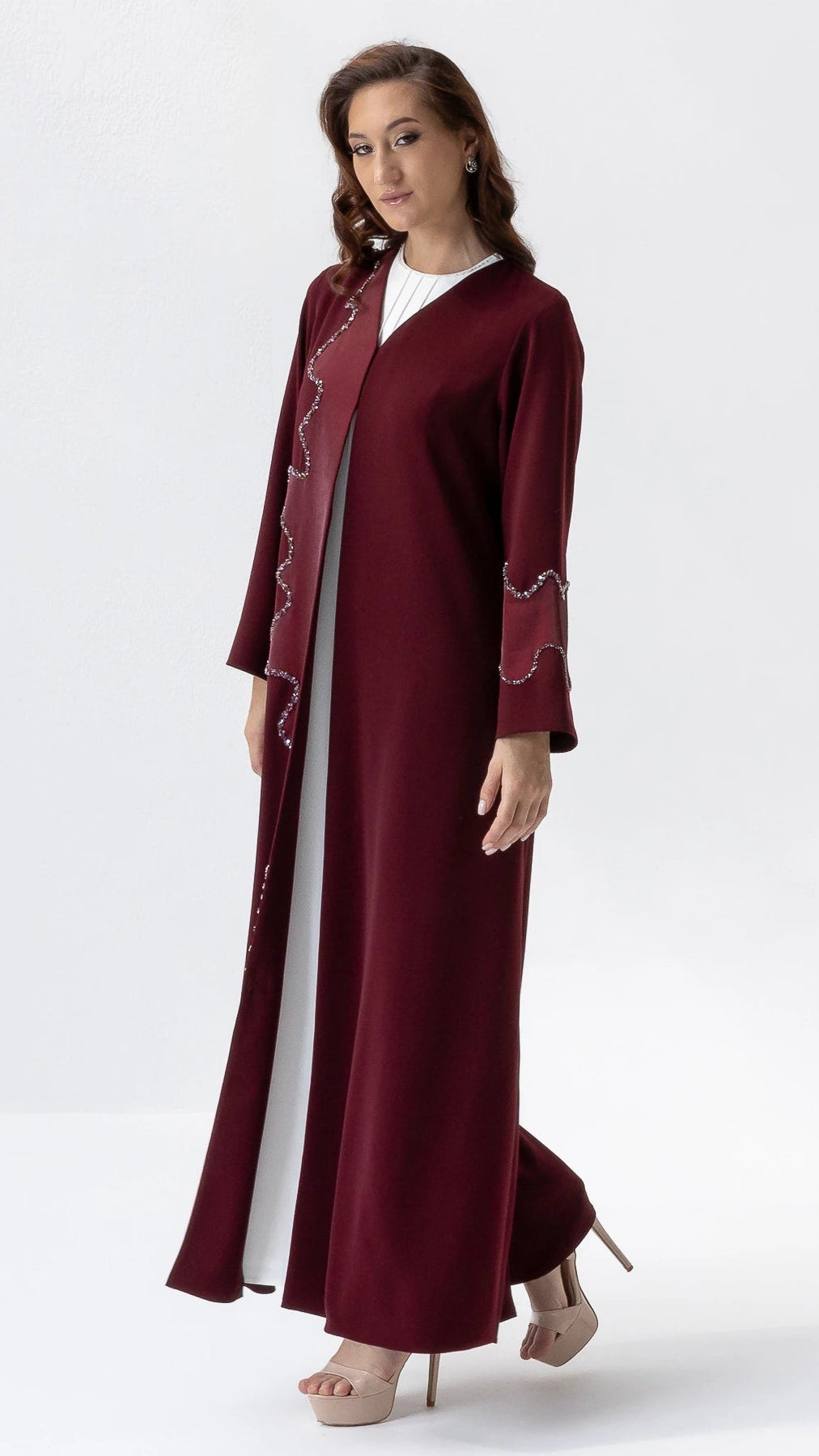 Full-length luxury mulberry abaya by Diva Atelier featuring flowing silhouette and crystal shimmer accents