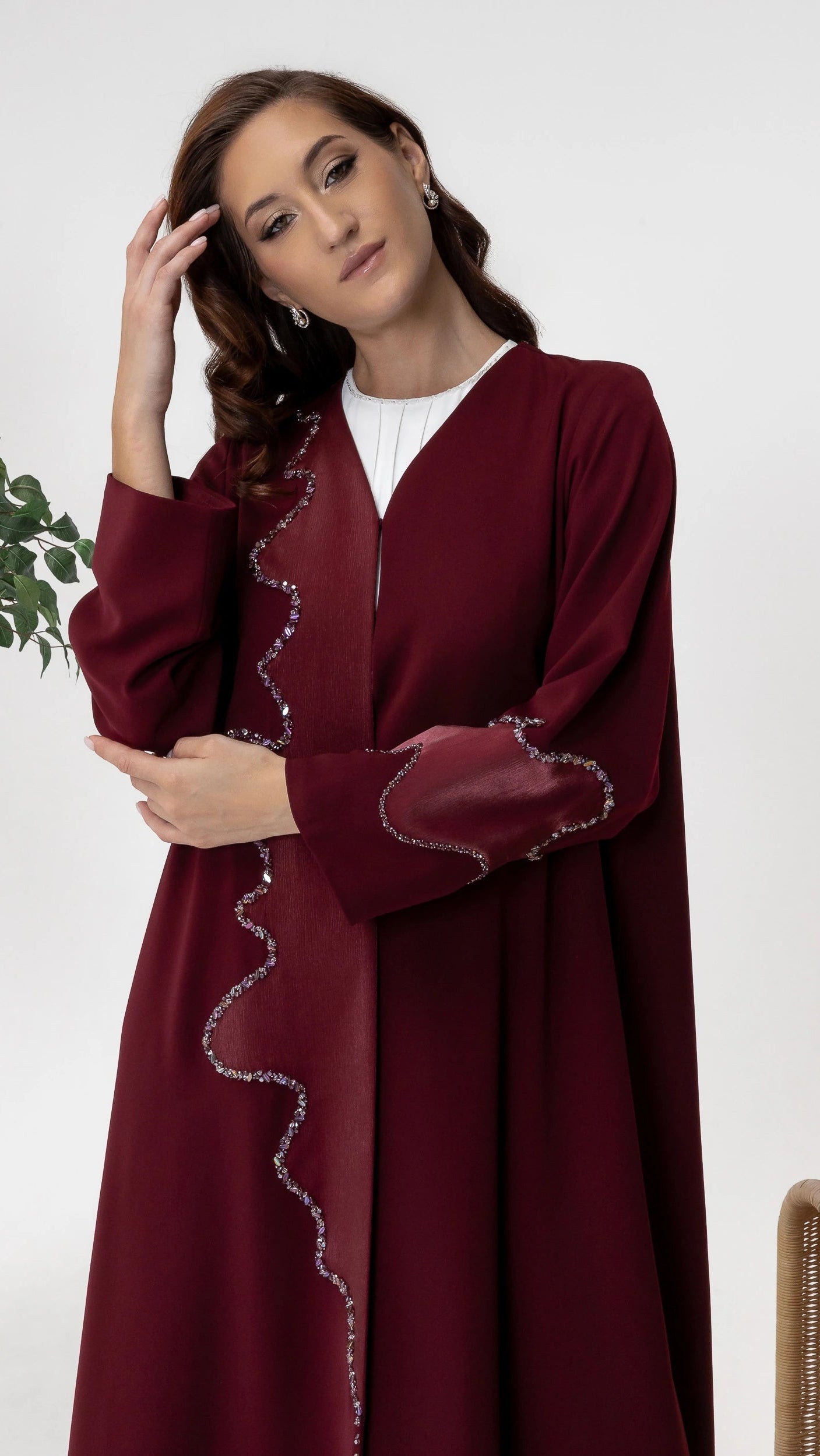 BARIQAH Mulberry Luxe - A Refined burgundy abaya with embellished sleeves and elegant Ramadan evening luxury styling