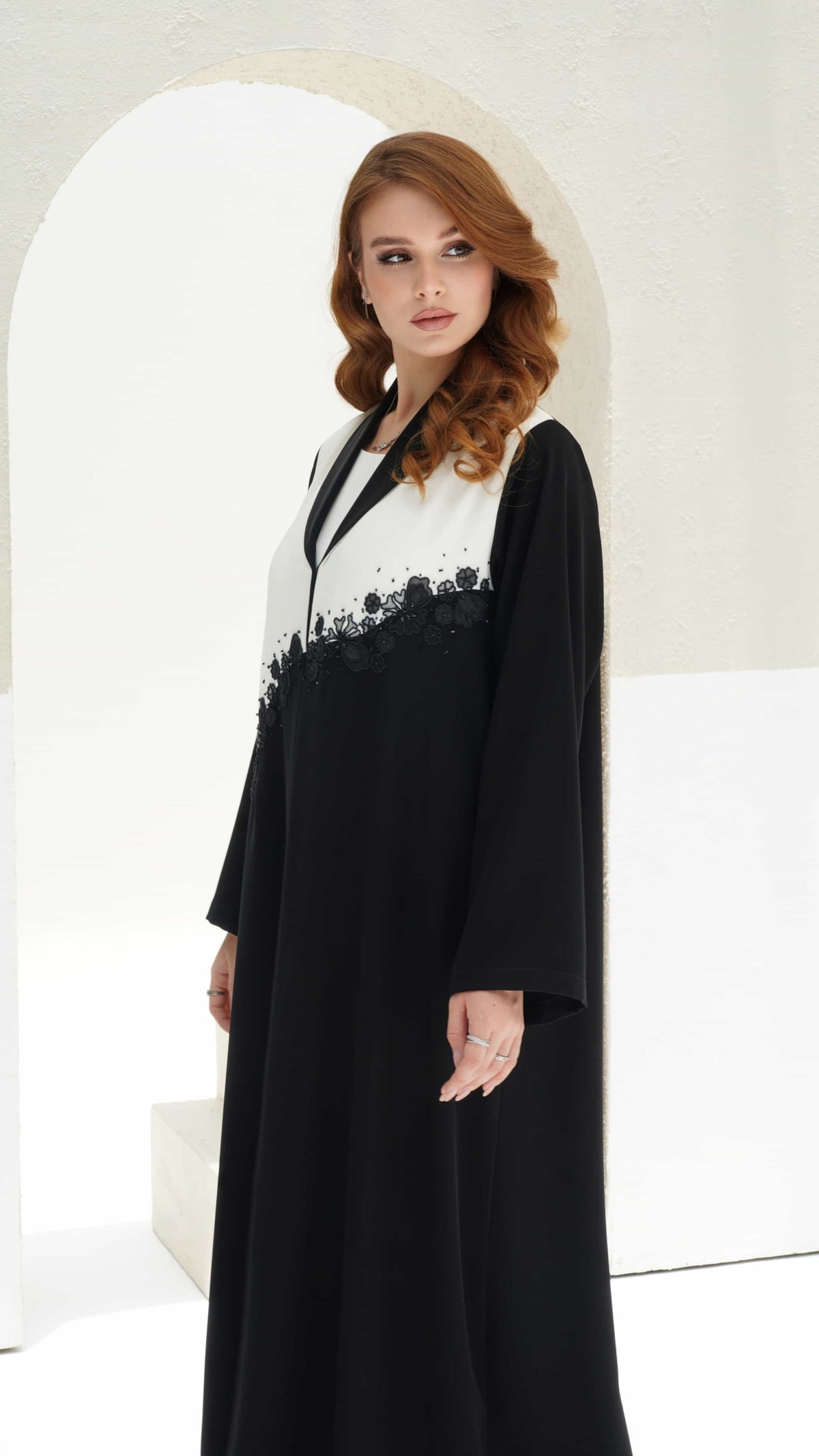 CHERINE | Noir Bloom Side Full length black and white abaya with flowing silhouette