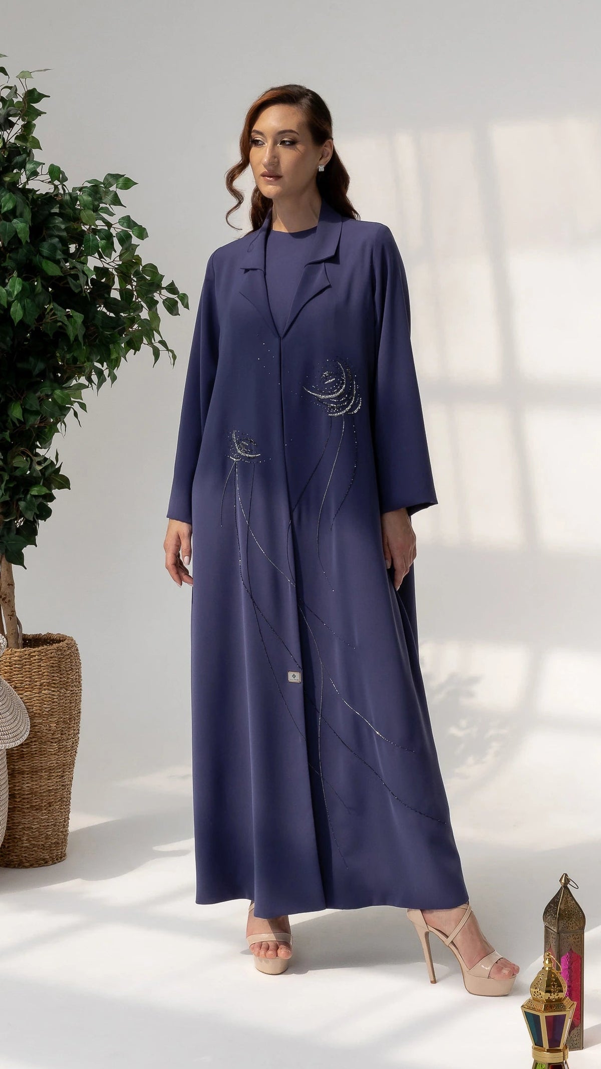 Full-length DAHANA Violet Bloom abaya showcasing elegant movement and couture modest fashion styling