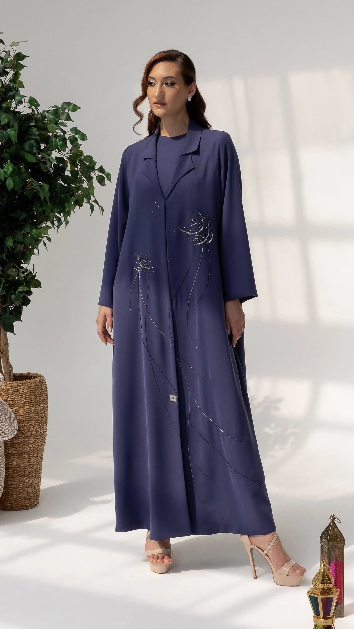 Full-length DAHANA Violet Bloom abaya showcasing elegant movement and couture modest fashion styling