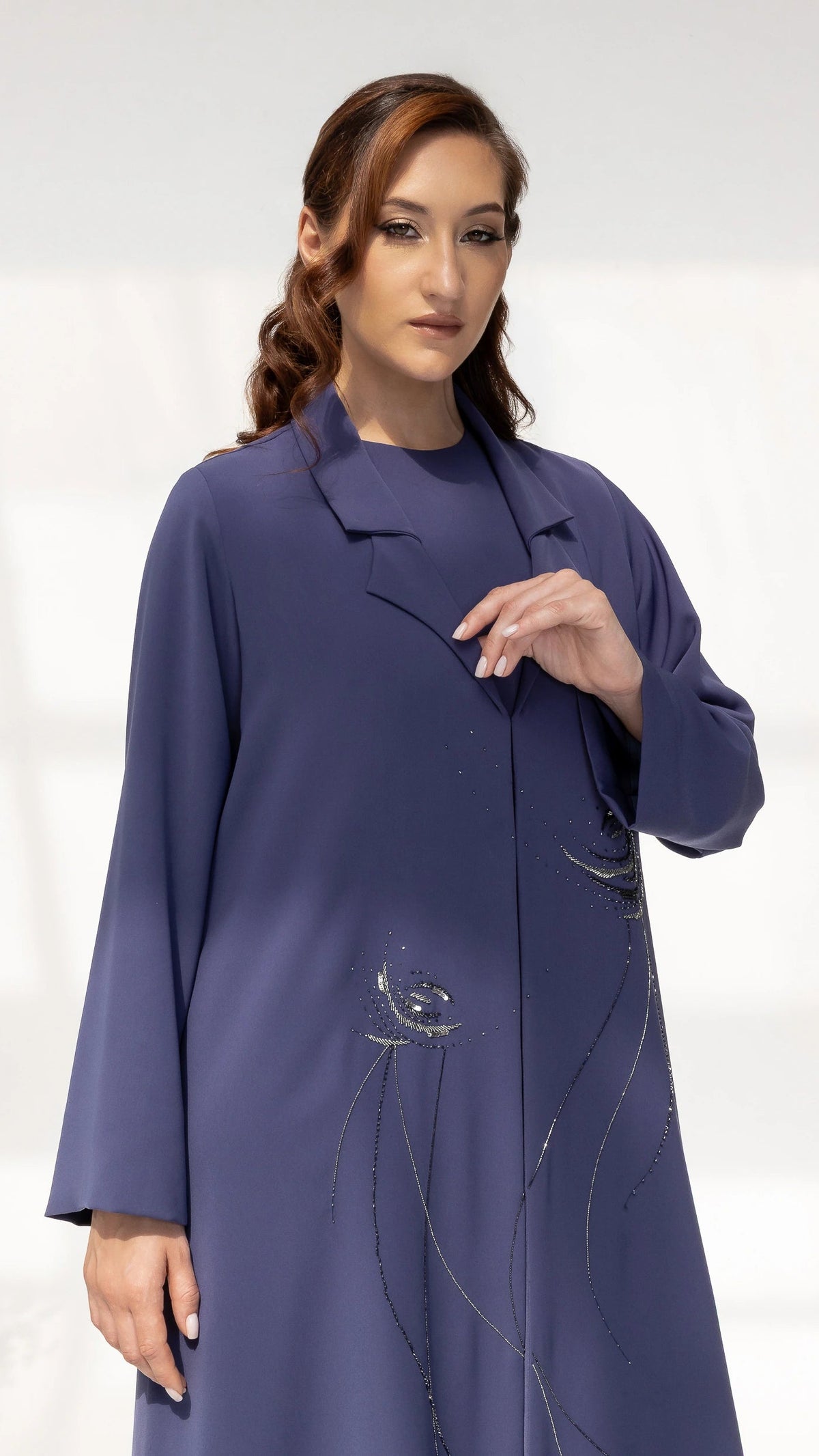 Close-up side profile of DAHANA Violet Bloom abaya with refined crystal bloom embellishments