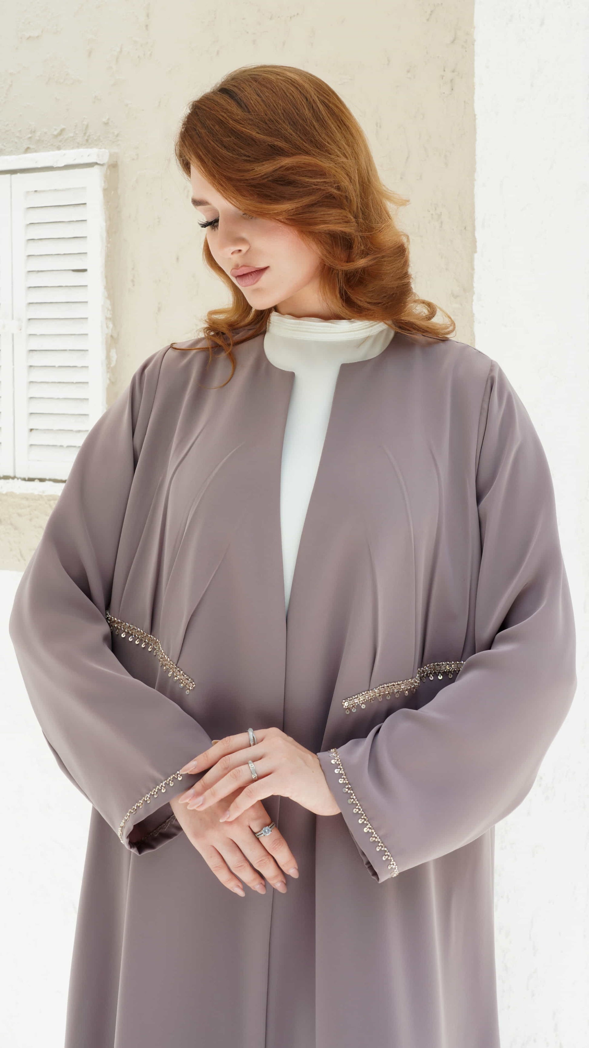 DOUNIA | Blush Aura Close up of waist detailing with delicate sequin embellishments on mauve abaya 