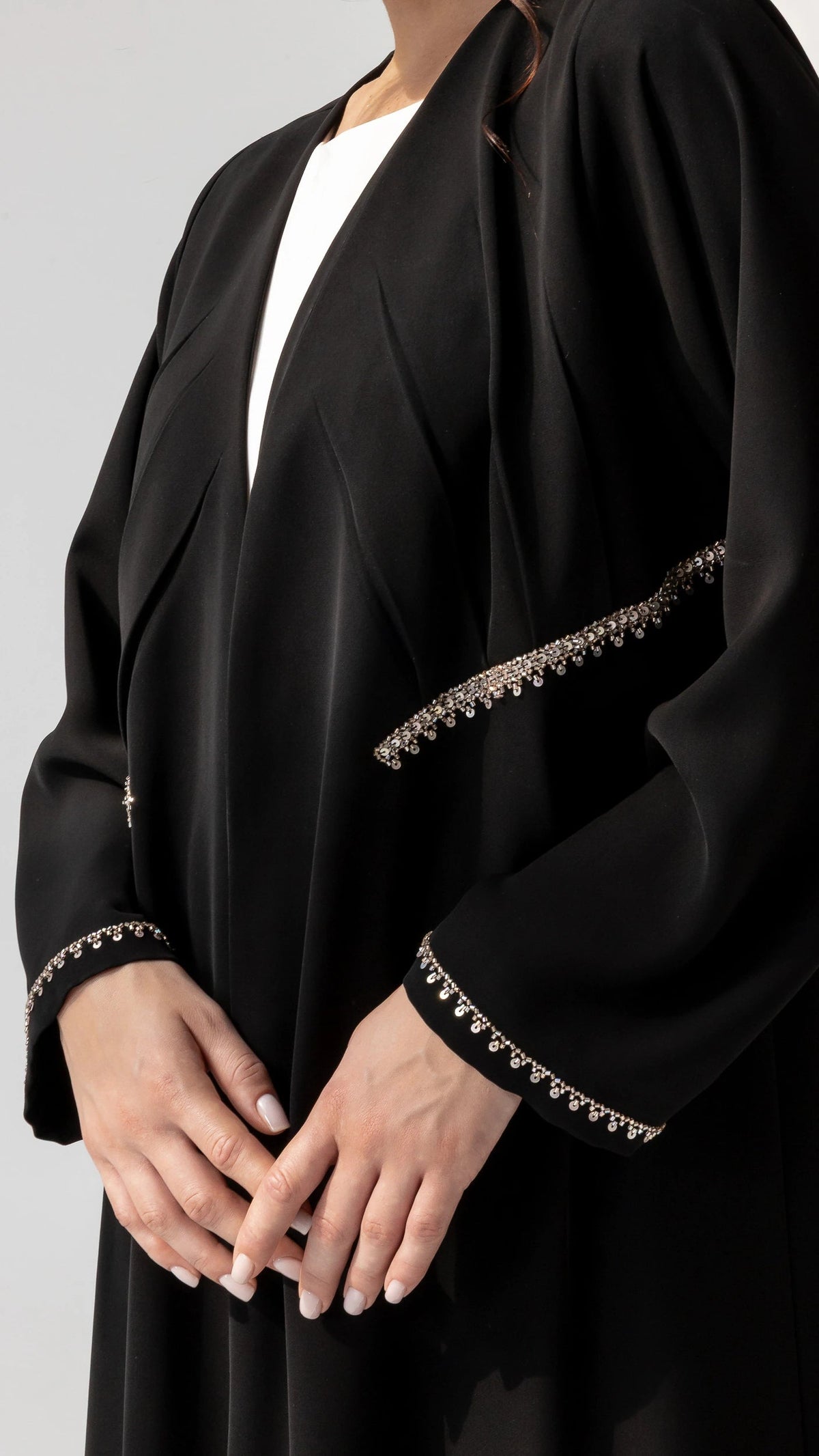 DOUNIA Noir Lumiere Detailed sleeve and cuff crystal edging on premium black couture abaya by Diva Atelier