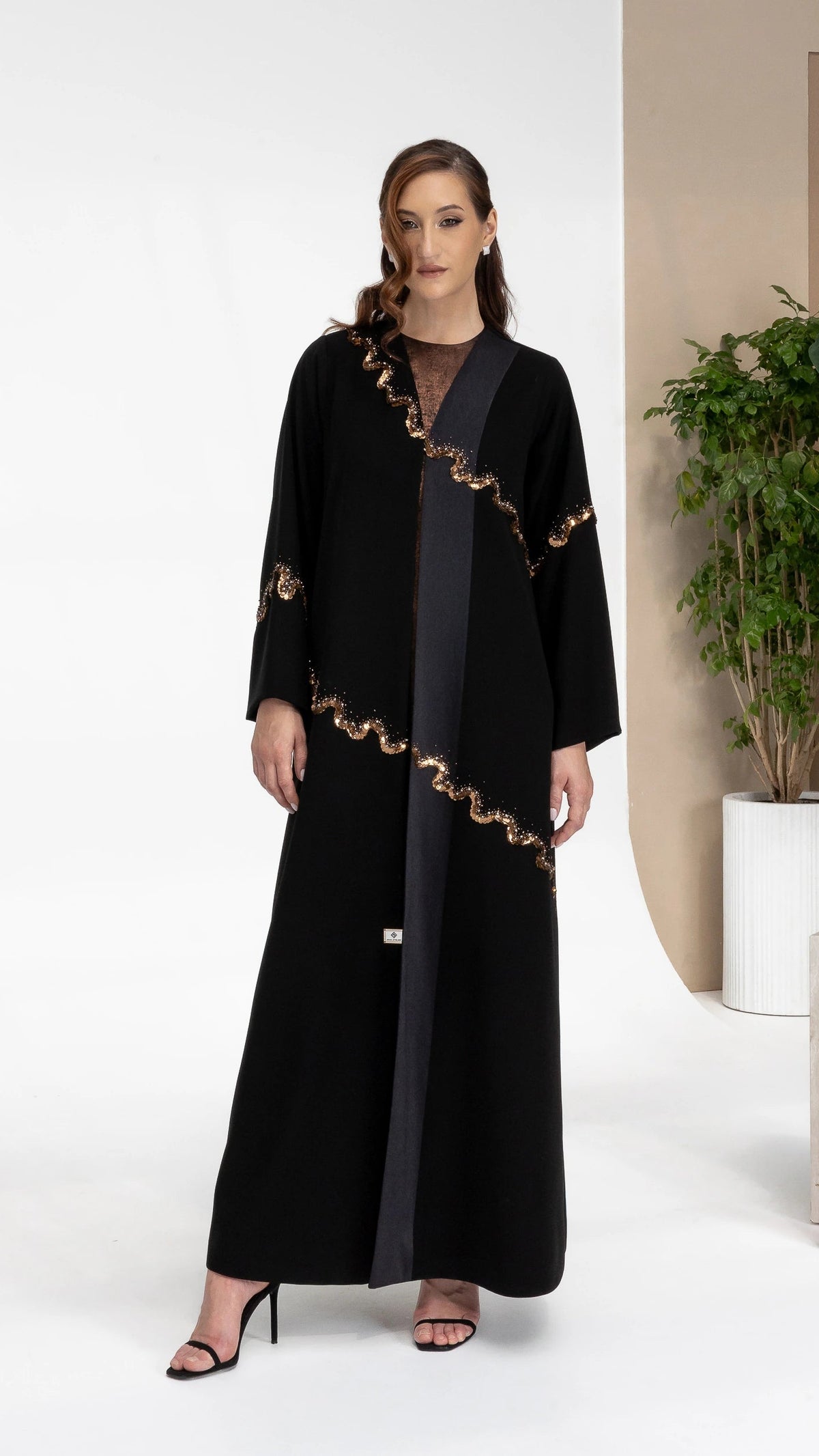 GHALA Copper Luxe black abaya with cascading copper sequin contour detailing by Diva Atelier