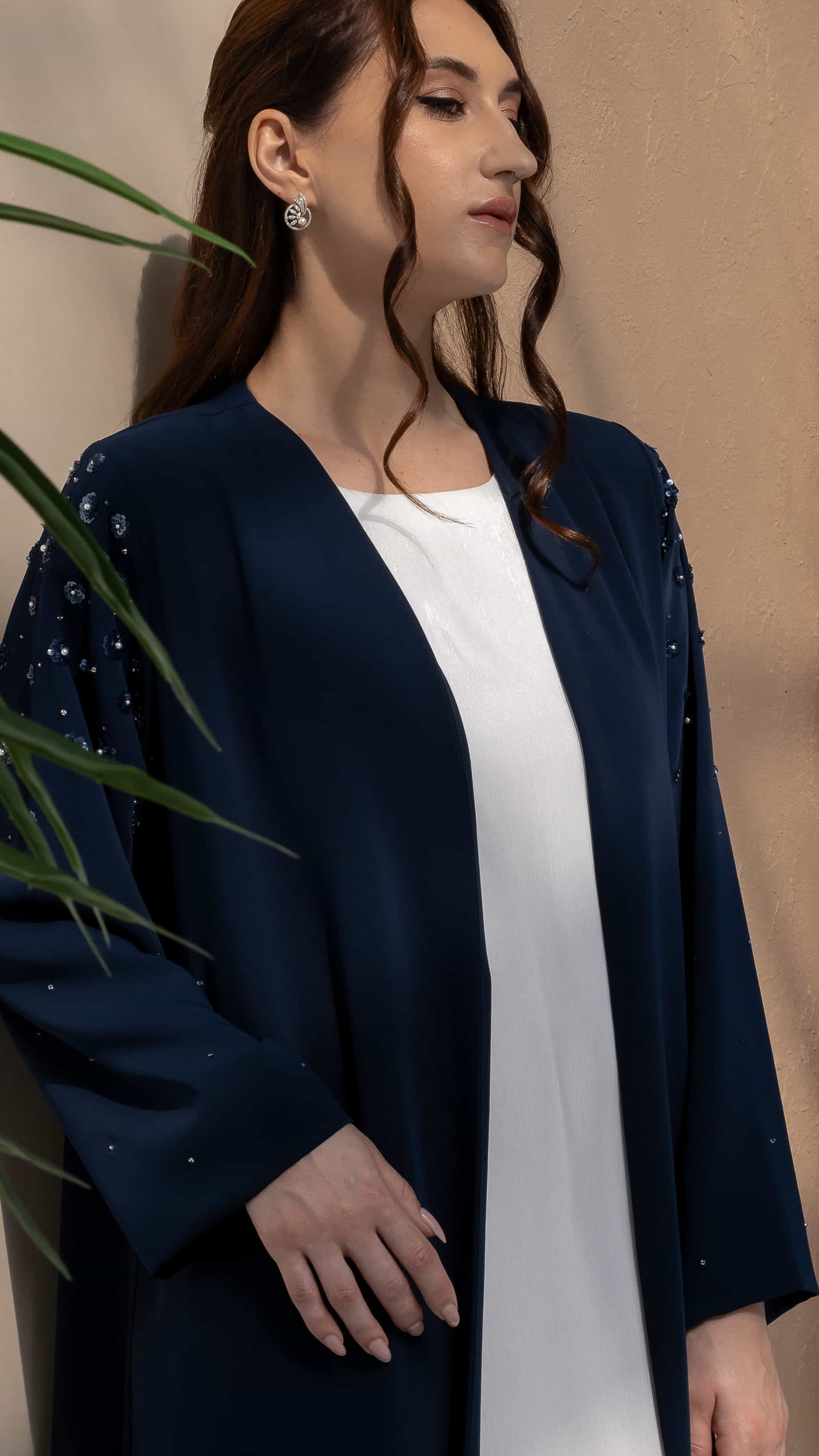 HANA | Sapphire Petal Bloom Editorial Minimal navy abaya with refined floral detailing front pose