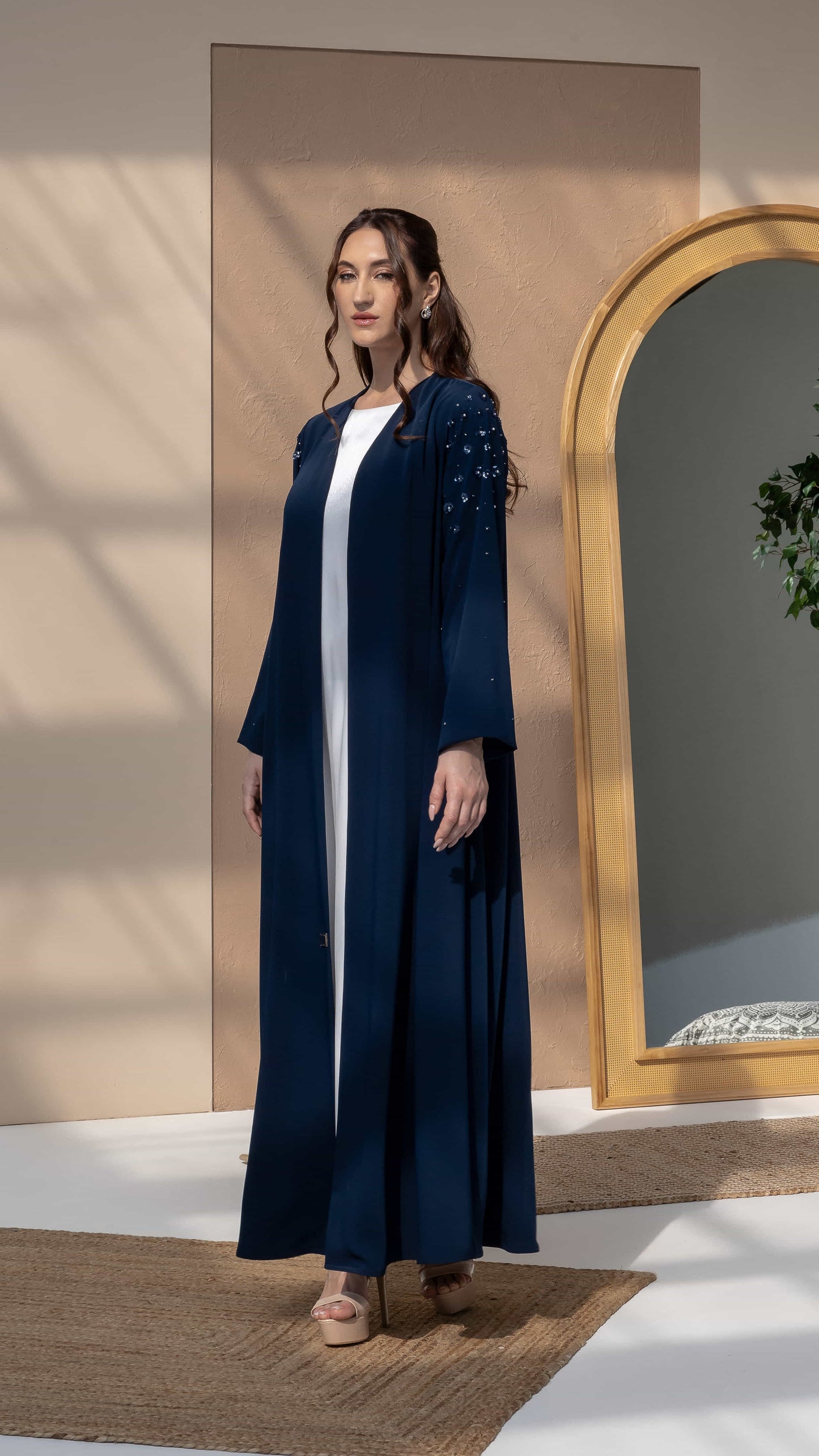 HANA | Sapphire Petal Bloom Elegant sapphire abaya flowing silhouette studio setting
