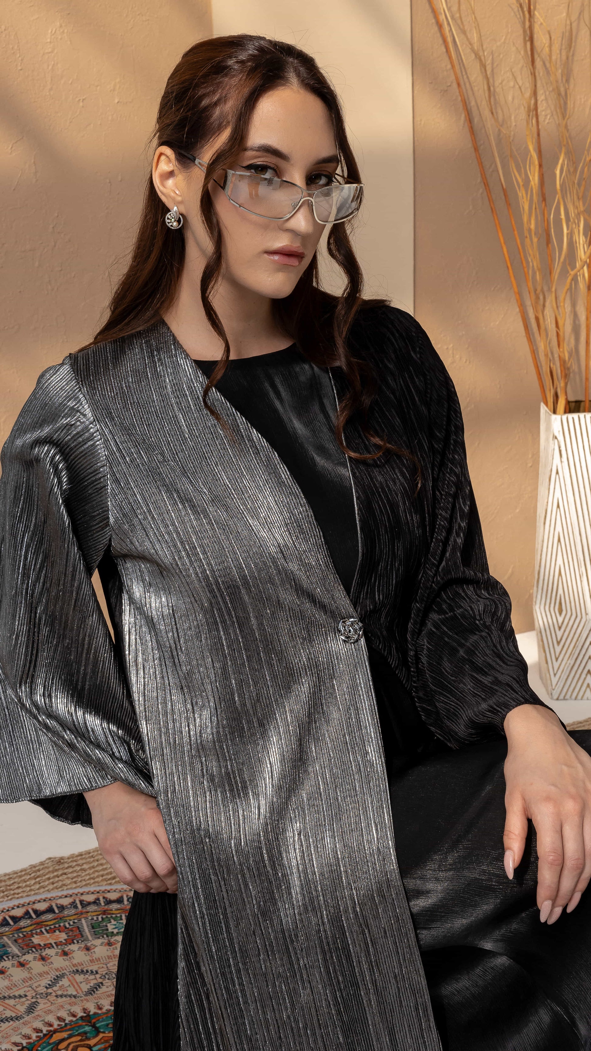 HIND Noir Argent Luxe Buttoned up silhoutte while model is seated