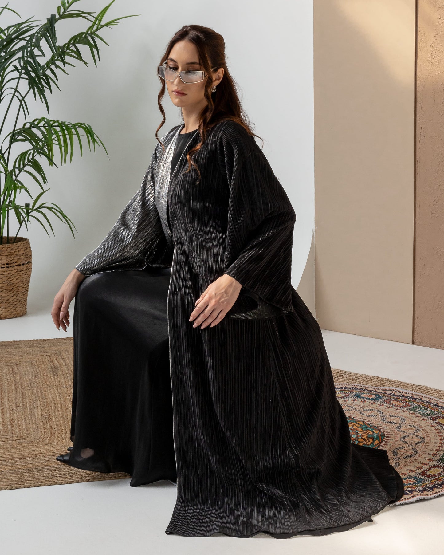 HIND Noir Argent Luxe Fashion Editorial Pose of flare and drape and flare in the sleeves