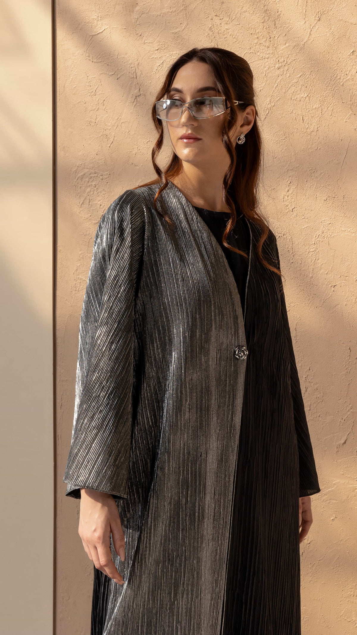 HIND | Noir Argent Luxe side profile HIND abaya showing dual tone shine and drape