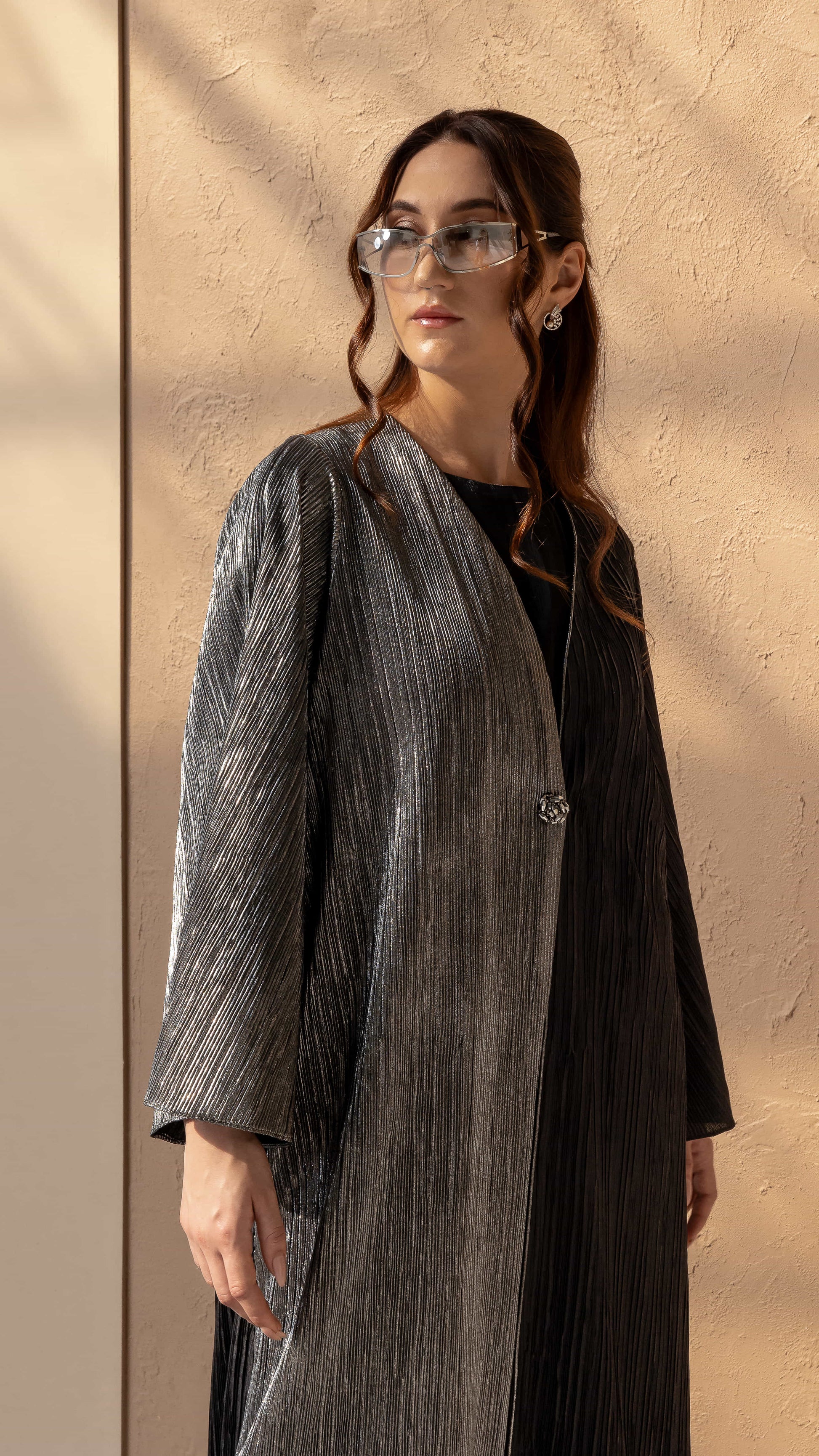 HIND | Noir Argent Luxe side profile HIND abaya showing dual tone shine and drape