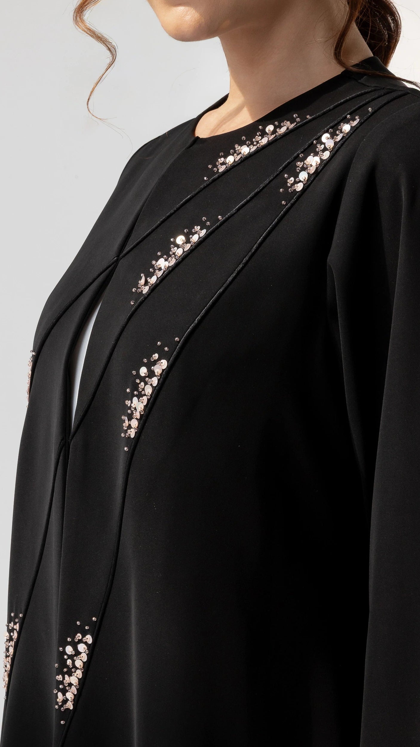 JAWA Noir Constelle Designer black abaya with diagonal layered panels and delicate crystal shimmer 