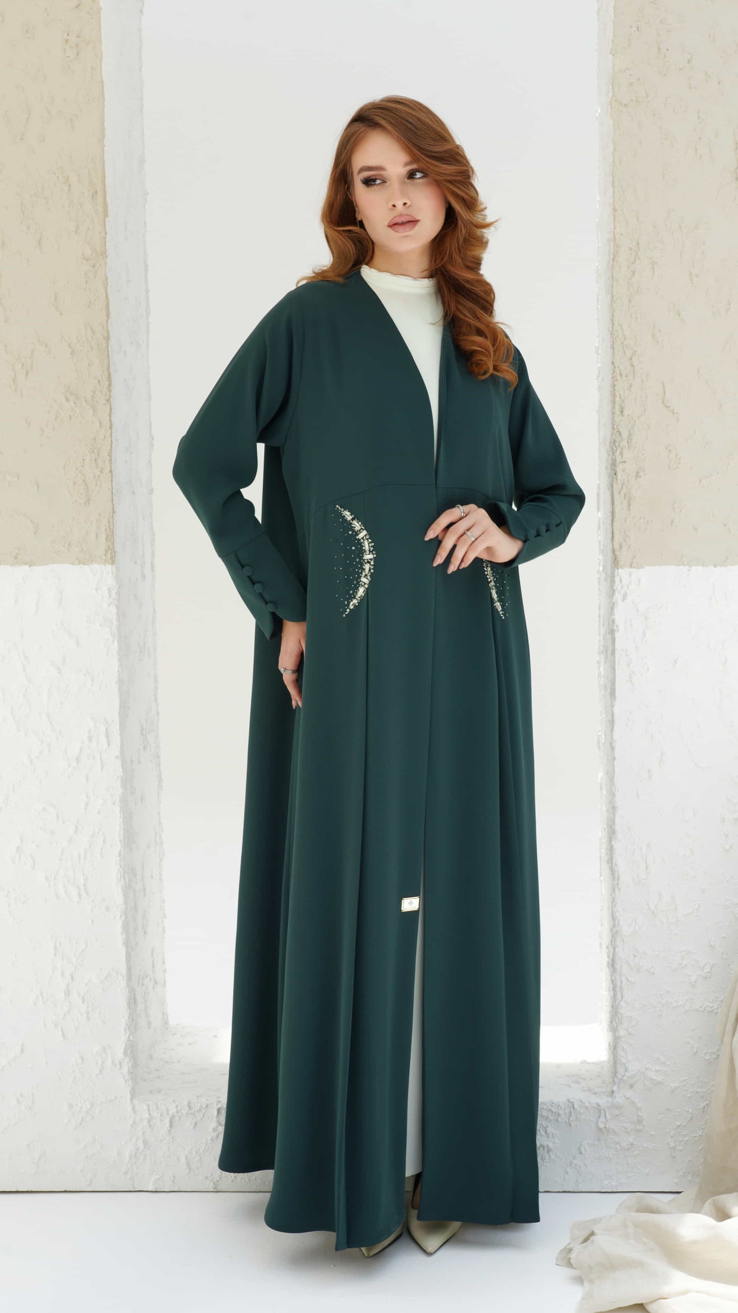 KAINA green abaya modest fashion elegant look Dubai