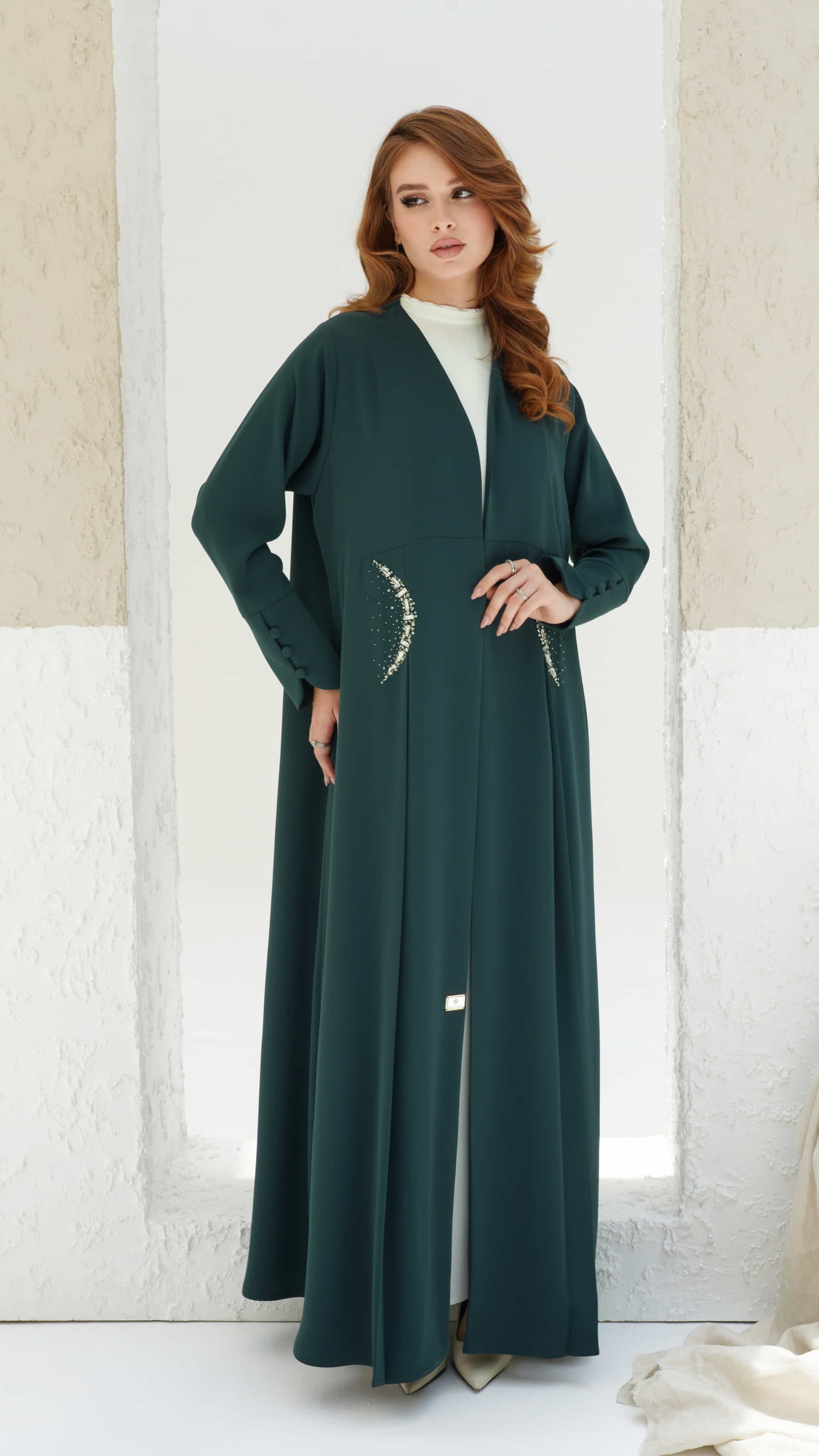KAINA green abaya modest fashion elegant look Dubai