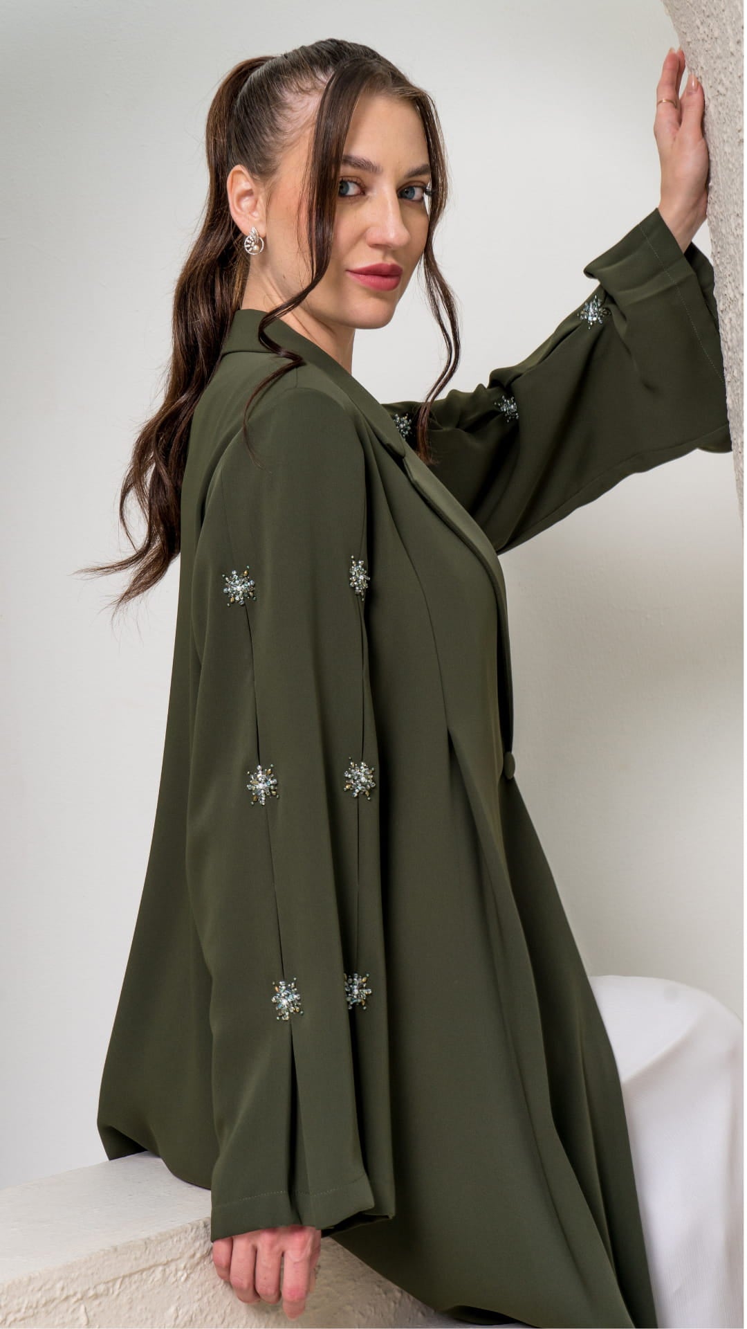 KAMILAH | Olivine Starfall Close up of crystal star embellishment on sleeve Kamilah abaya
