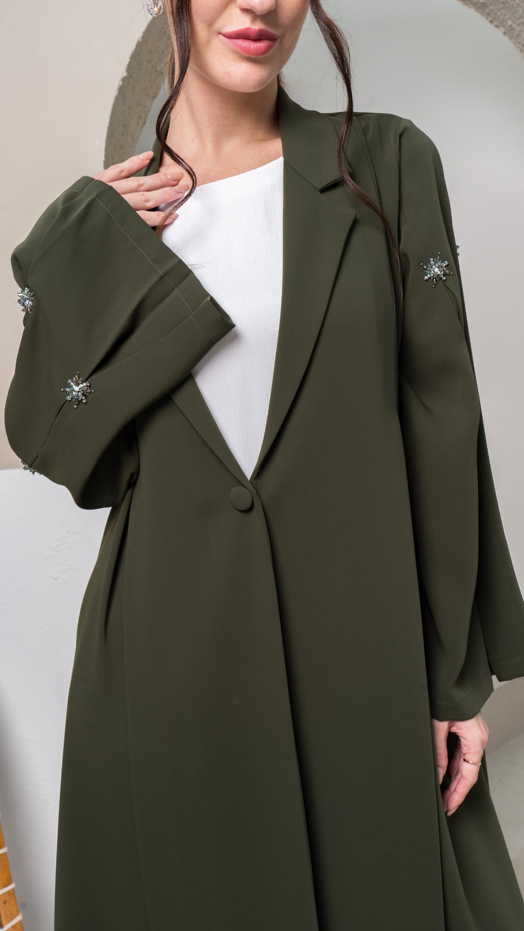 KAMILAH | Olivine Starfall Close up of tailored lapel and star details Kamilah Starfall