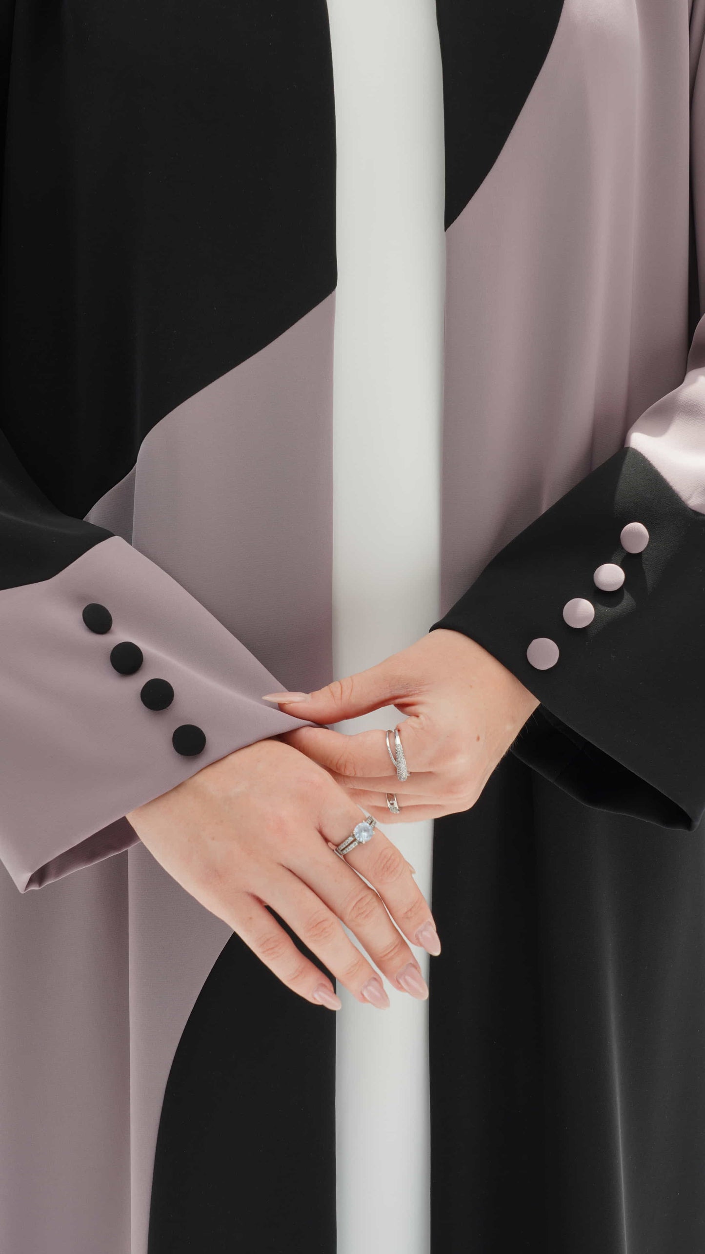 KENZA | Dual Tone Muse Sleeve detail of mauve and black abaya with minimal button cuff finish