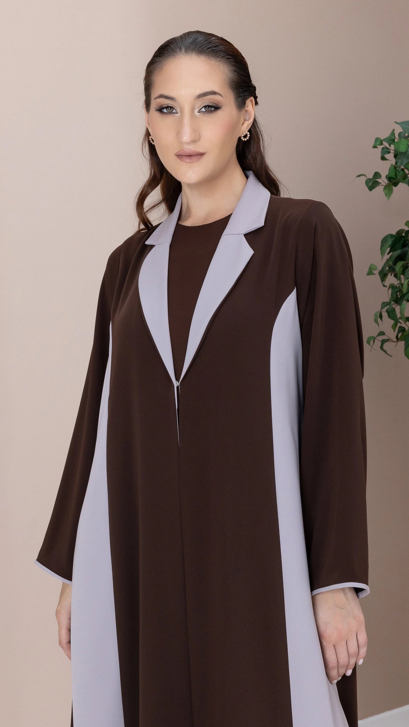Portrait of LAYMAR Cacao Taupe designer abaya with sophisticated feminine tailoring 