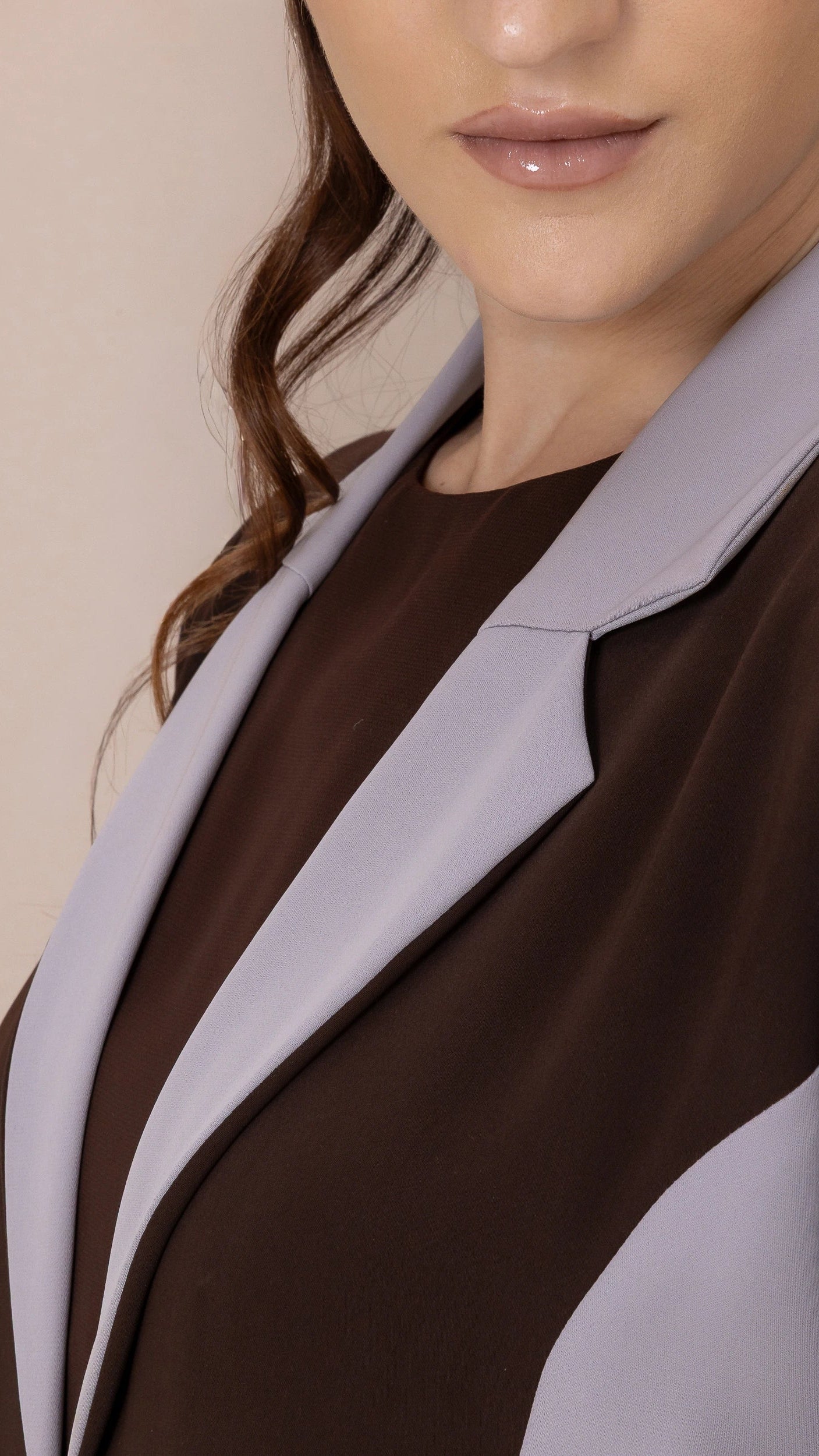 Close-up of LAYMAR Cacao Taupe luxury abaya with structured lapel detailing