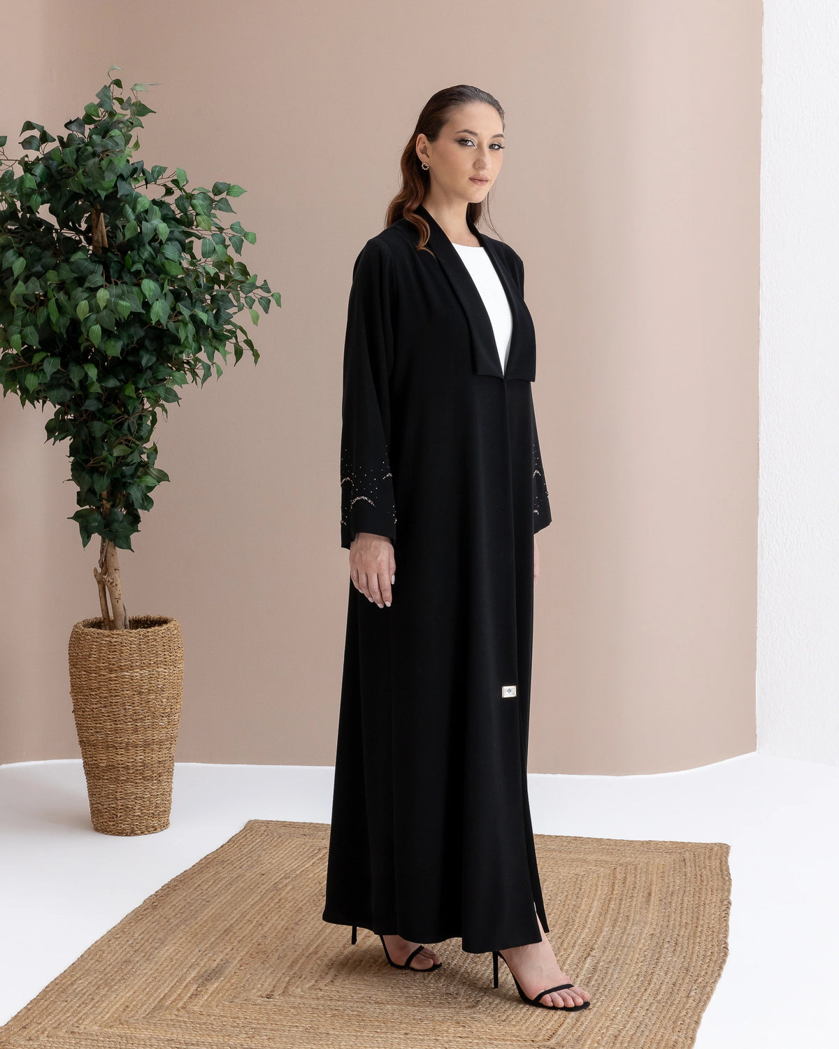 MAHNUR Noir Halo side-view designer abaya with graceful drape and understated evening luxury