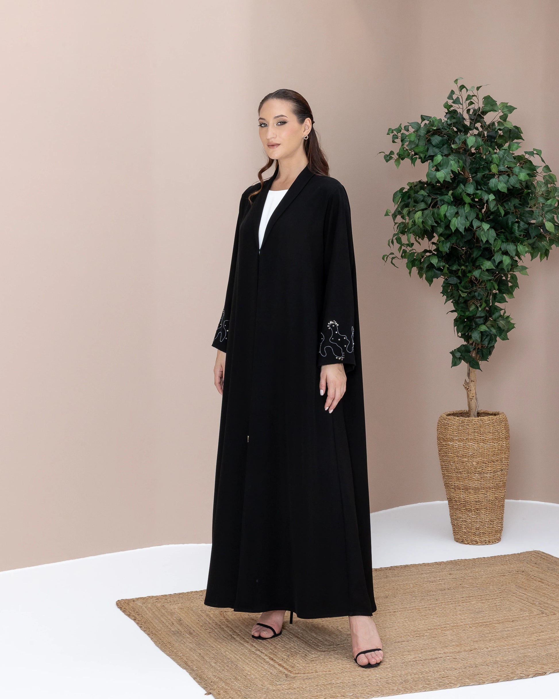 MAHREEN Noir Eclipse modern modest black abaya with subtle celestial-inspired crystal embellishments