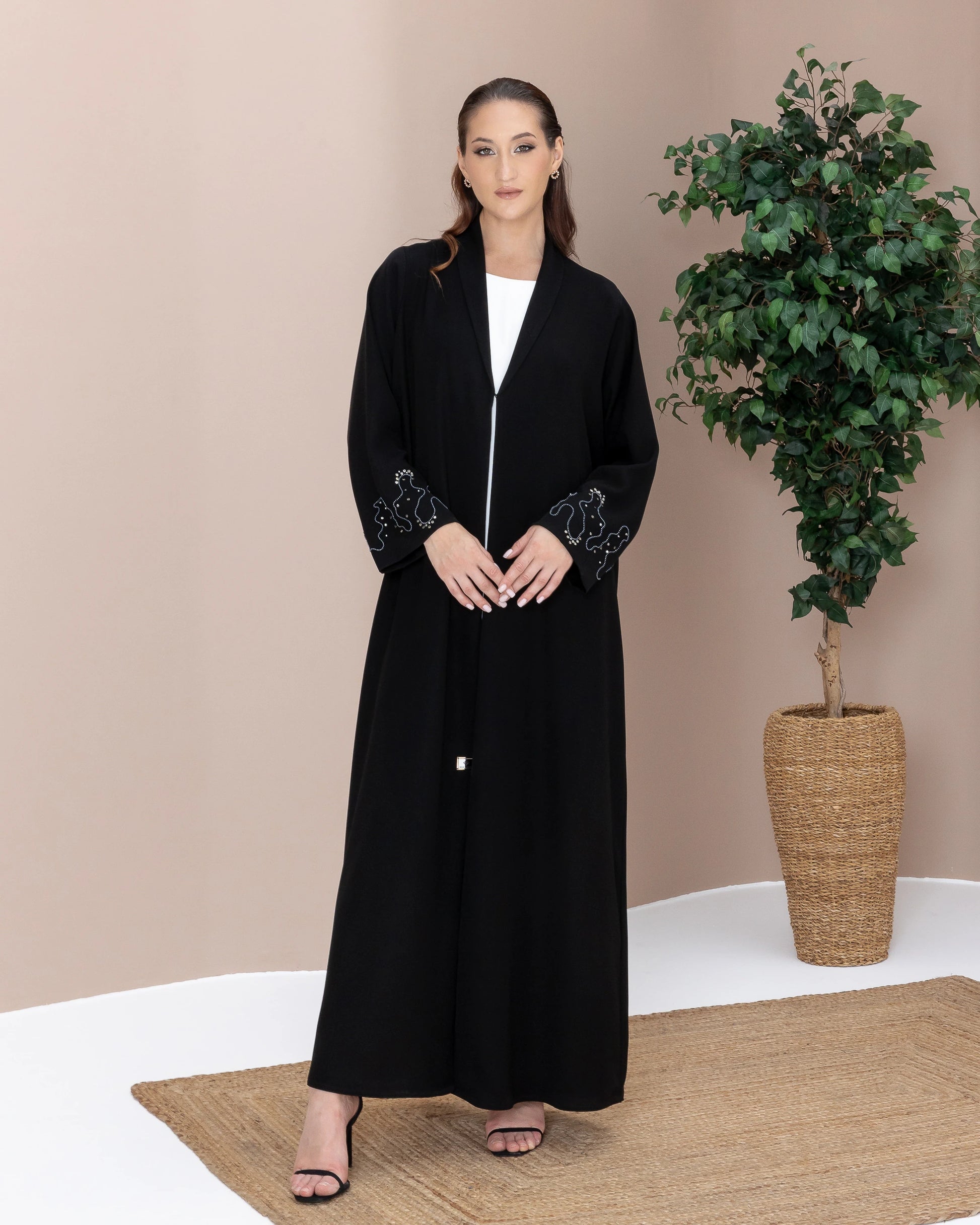 MAHREEN Noir Eclipse sophisticated black abaya designed with luminous crystal embroidery on the sleeves