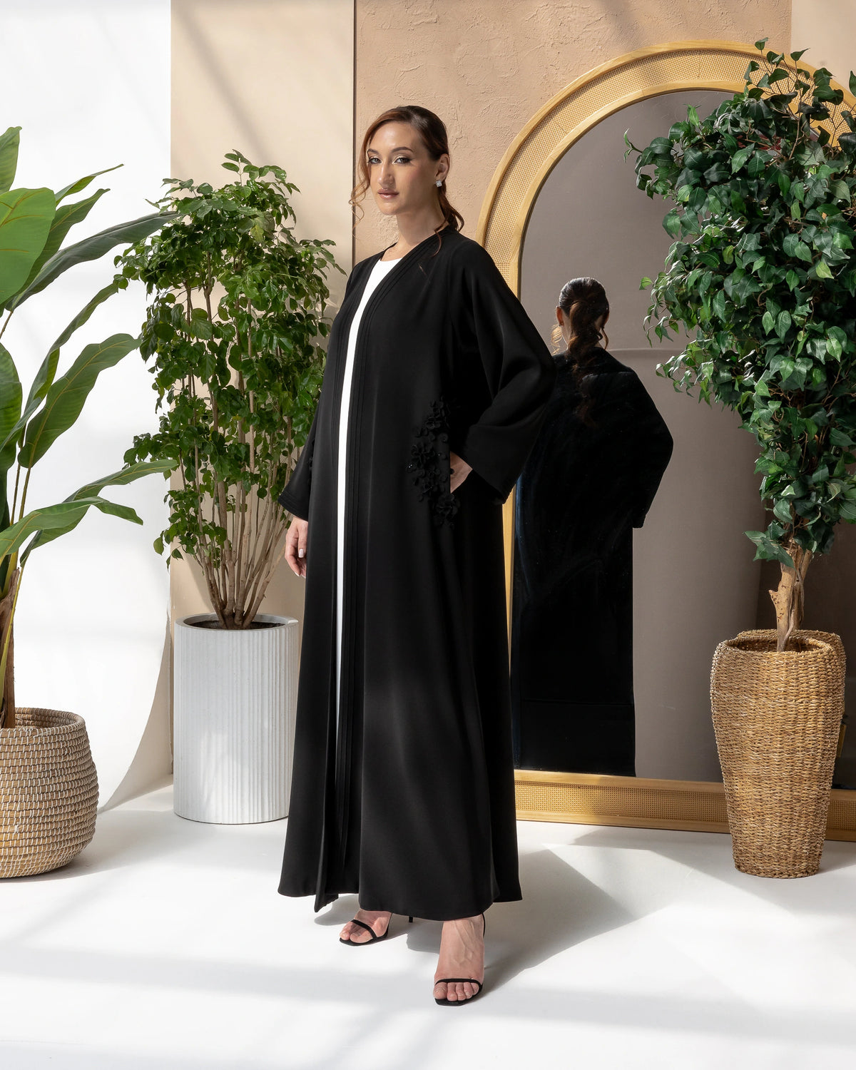 MELINA Noir Blossom sophisticated black abaya designed for Ramadan, Eid, and elegant evening occasions