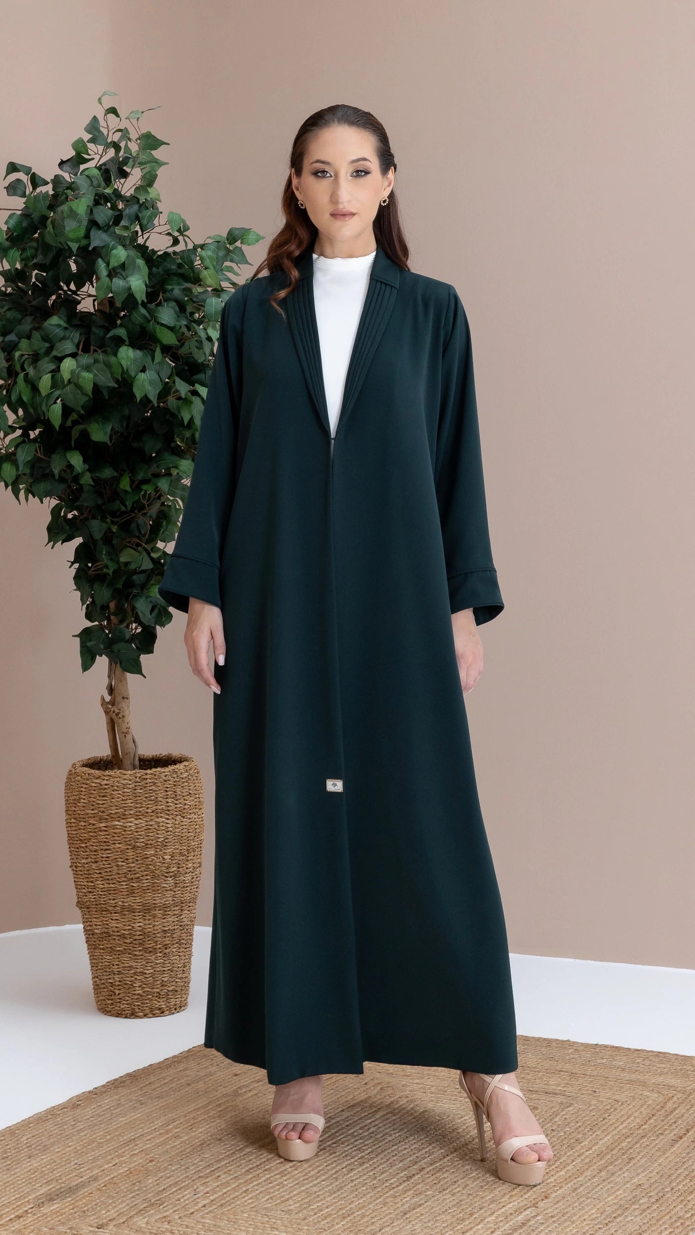 MIRAL Verde Royale luxury emerald abaya full-length editorial studio portrait