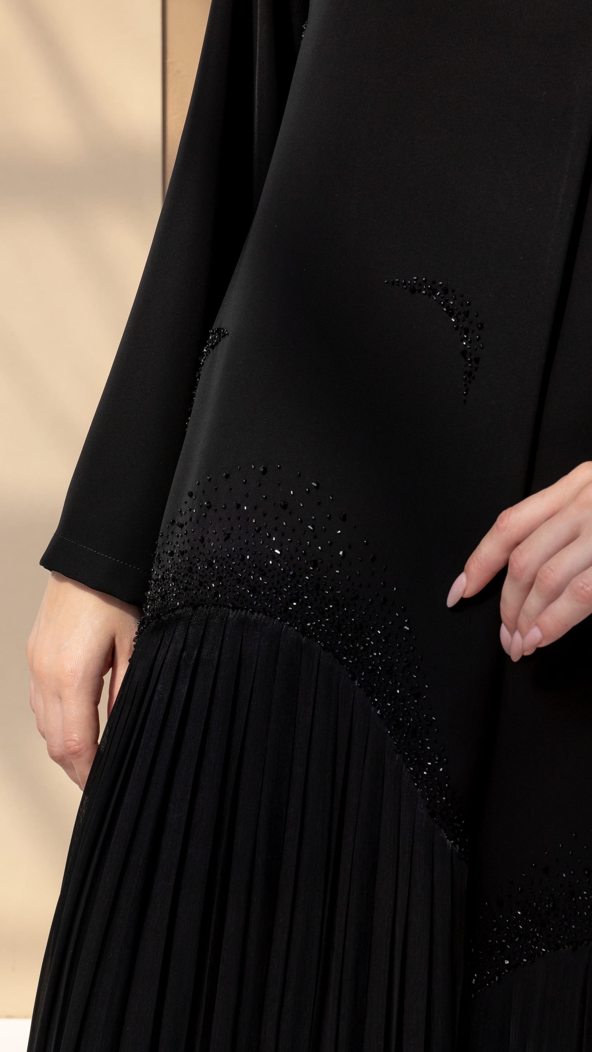 MIRA | Noir Shadow Luxe Detail shot of black crystal embellishment on Mira Noir Shadow Luxe abaya 