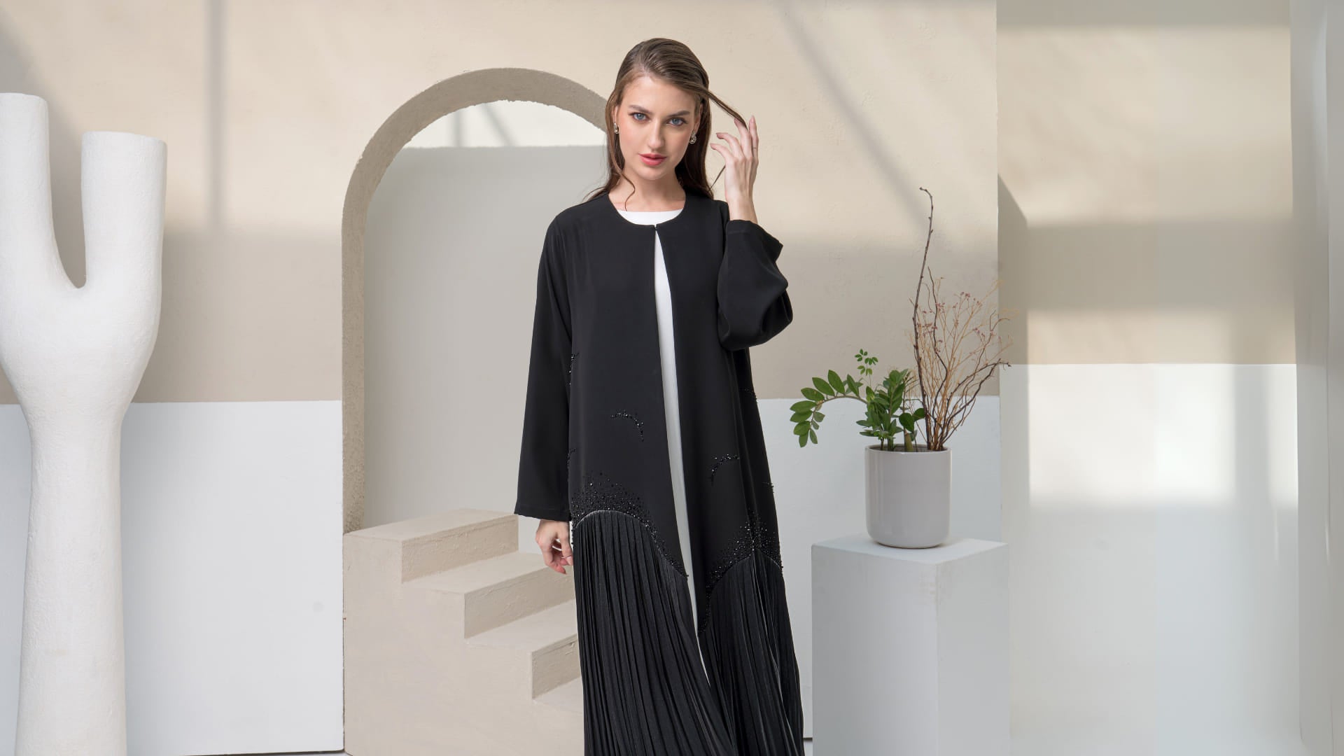 MIRA | Shadow Luxe Landscape Black abaya Mira Noir Shadow Luxe with inner contrast layer visible