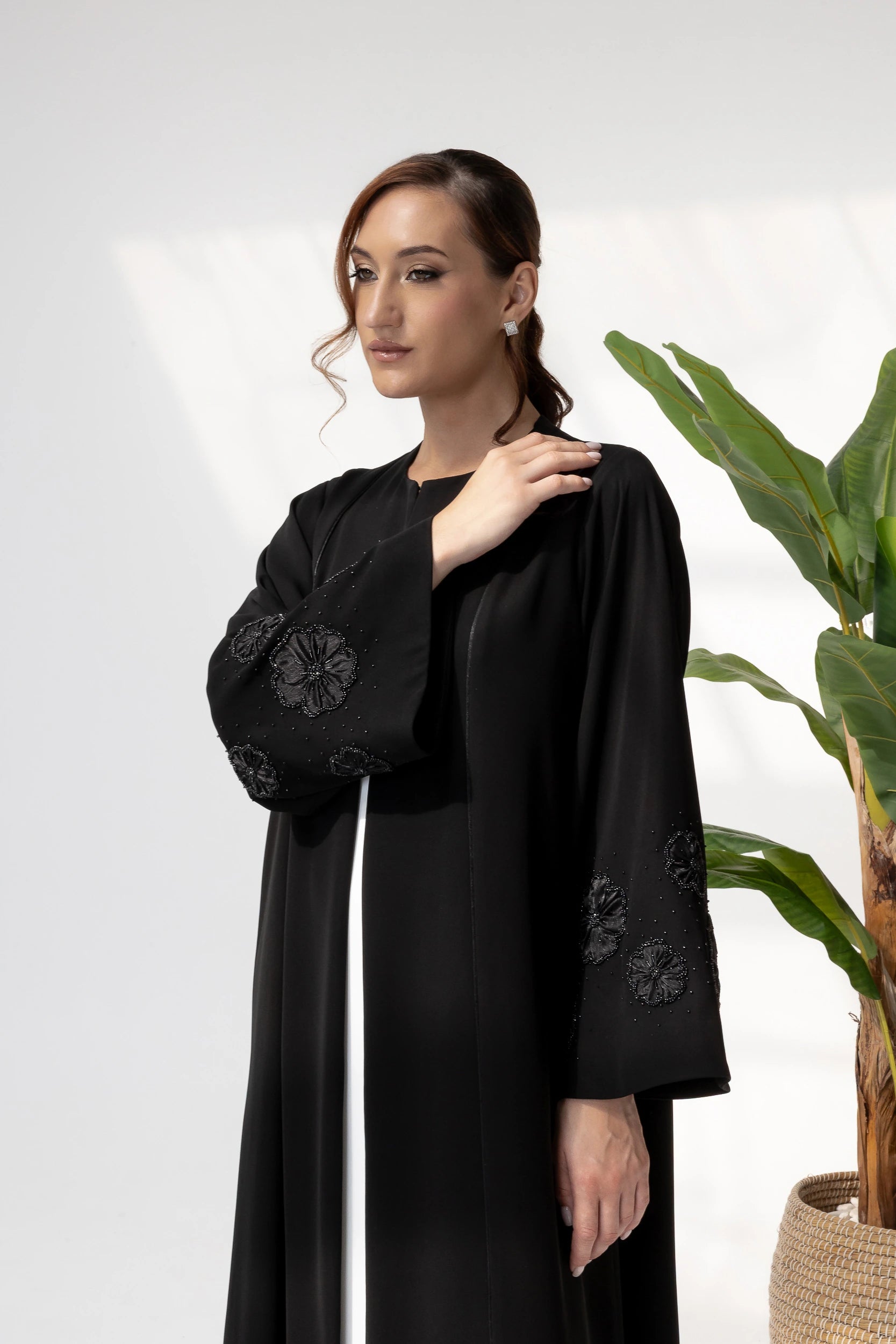NAFISA | Noir Blossom Luxe Abaya uxury modest wear abaya with hand-finished beadwork and floral sleeve accents