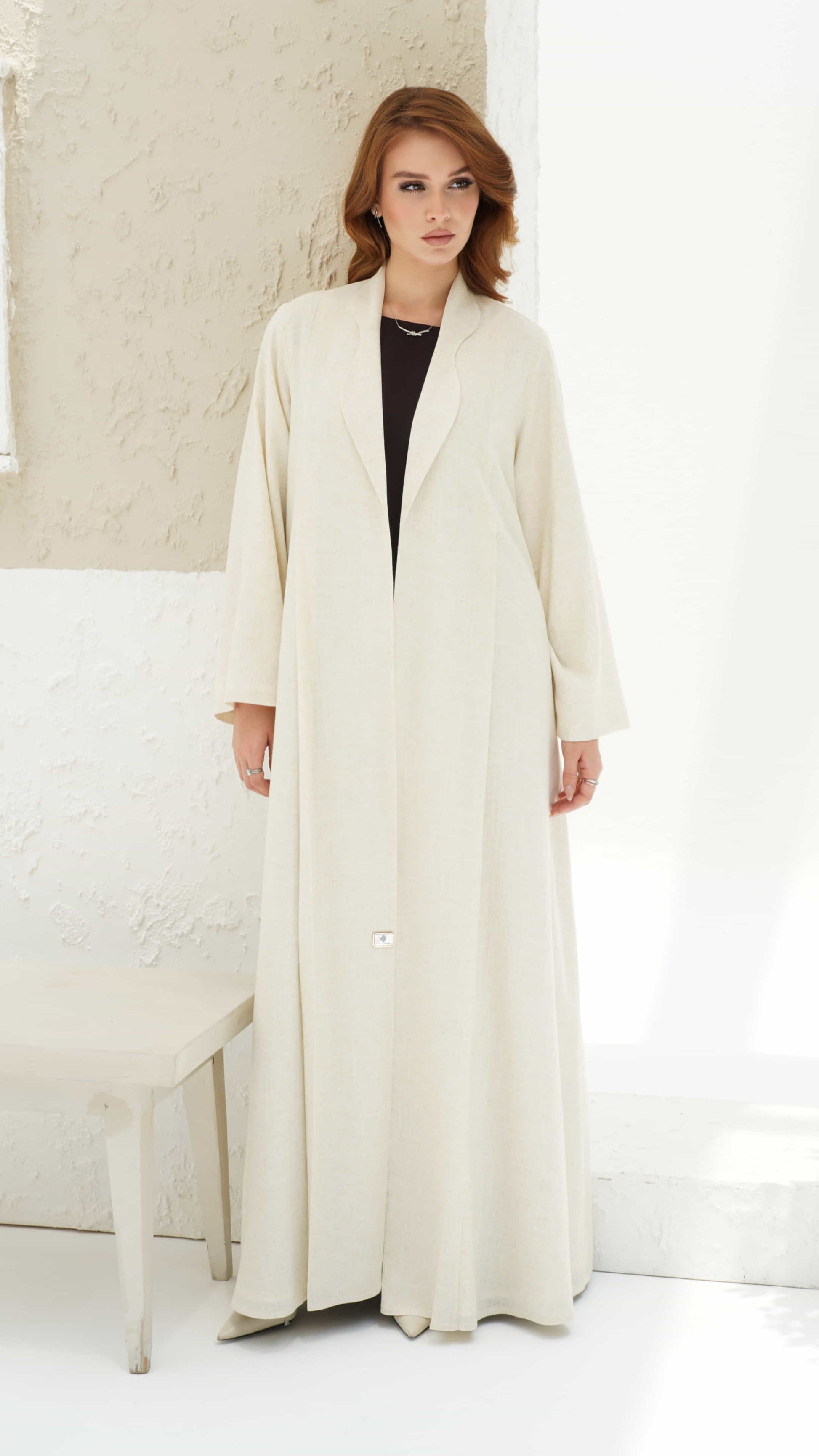 NAIMA | Ivory Elan - Naima ivory abaya with structured lapel and minimal luxury silhouette