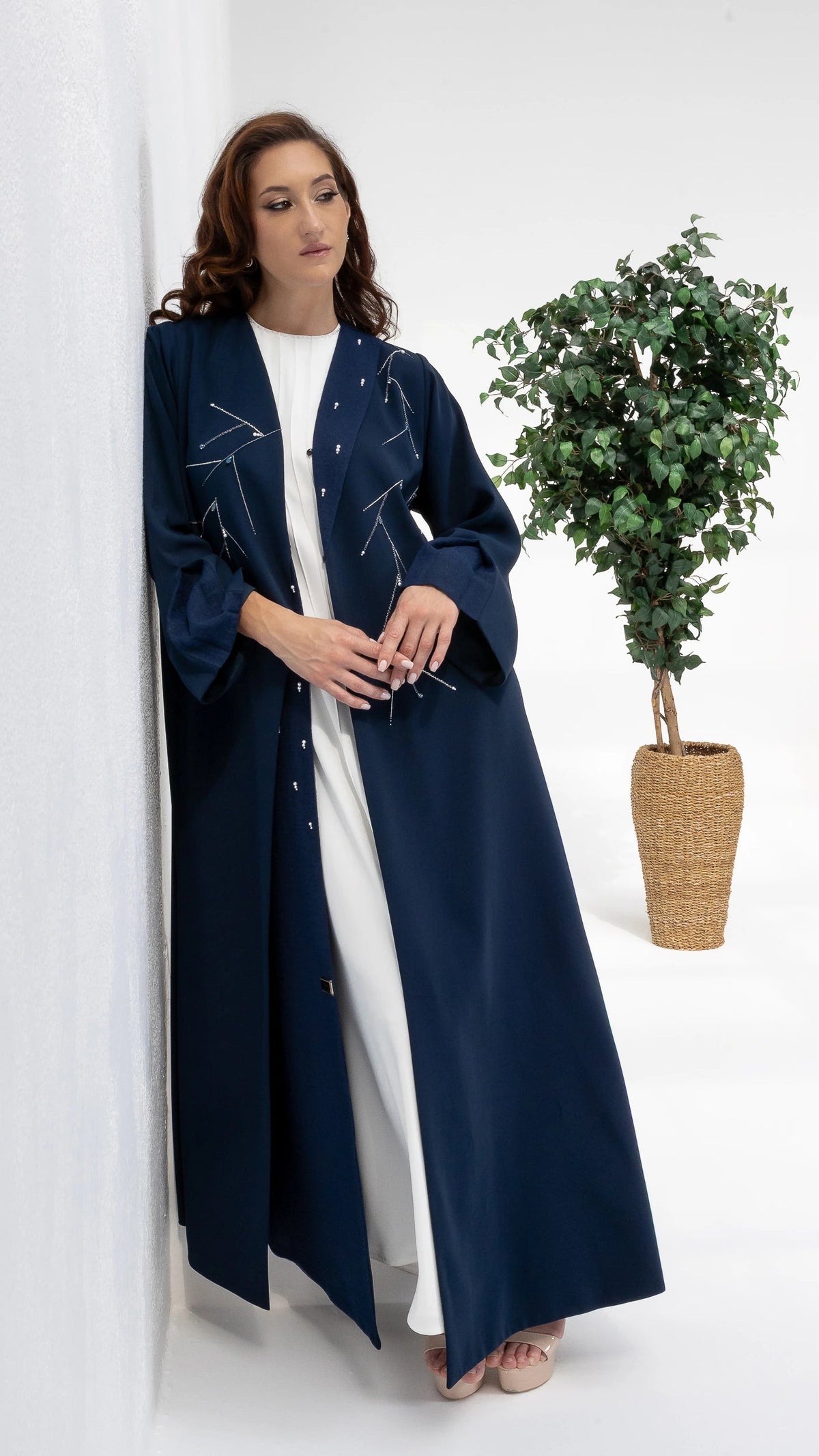 NAYRA | Twilight Luxe Abaya Editorial portrait featuring midnight blue designer abaya with crystal work