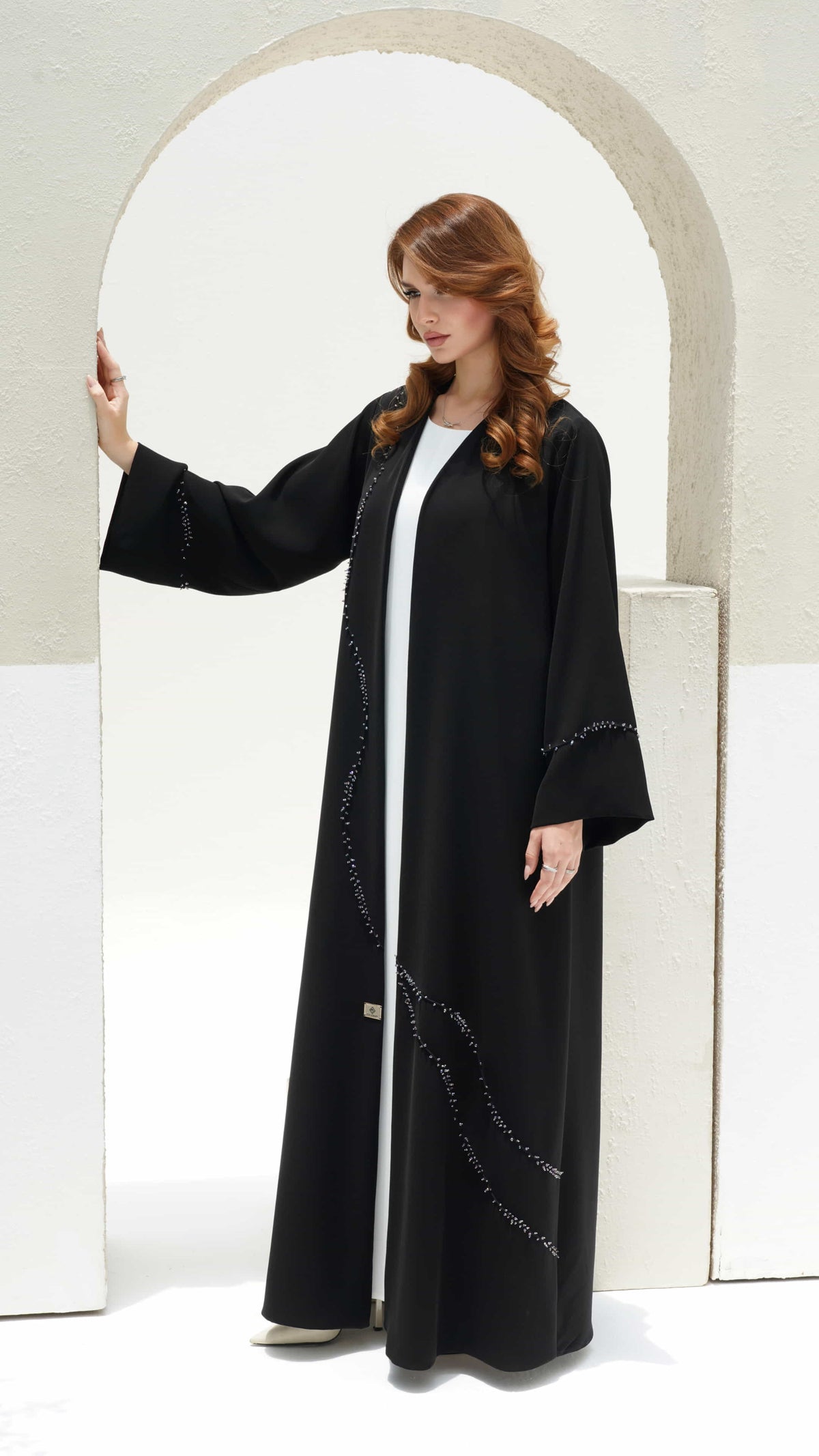 NISREEN | Noir Cascade Contemporary modest black abaya with refined elegance
