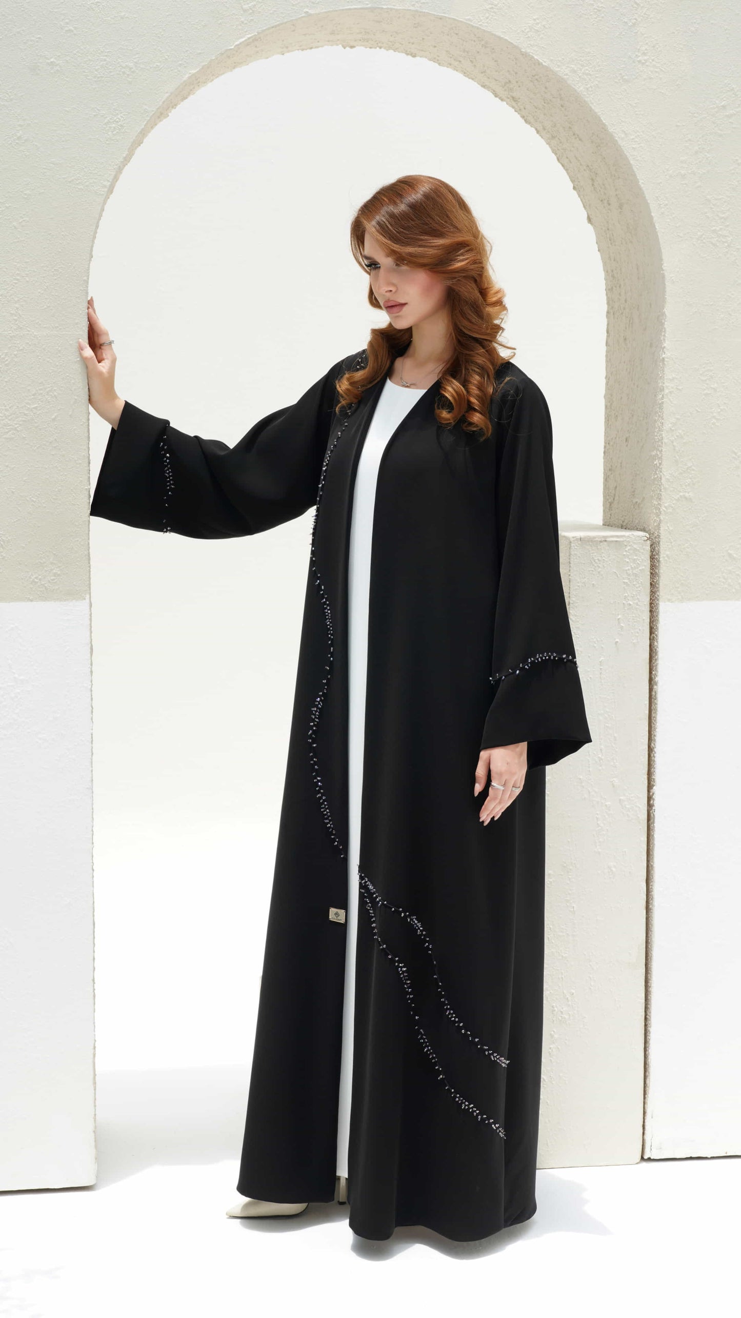 NISREEN | Noir Cascade Contemporary modest black abaya with refined elegance