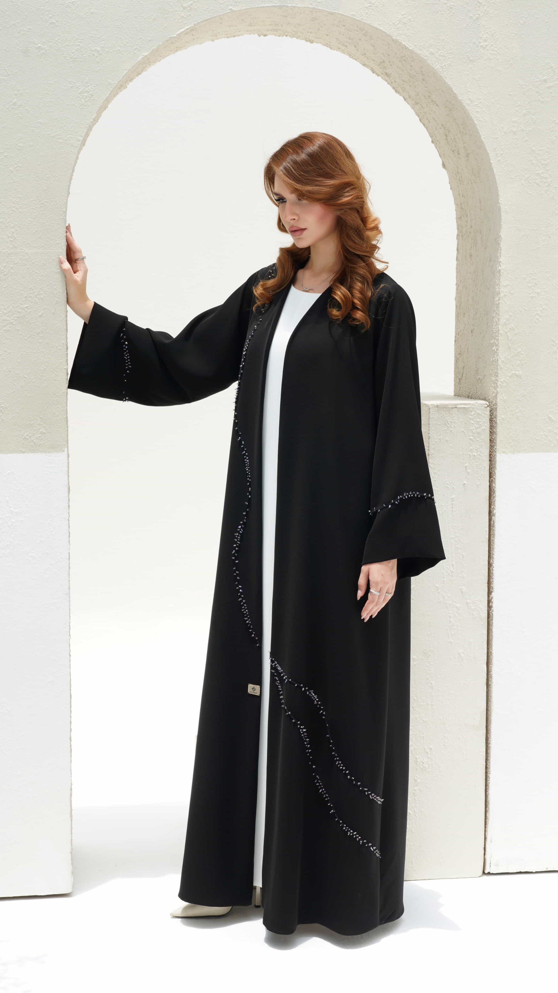 NISREEN | Noir Cascade Contemporary modest black abaya with refined elegance