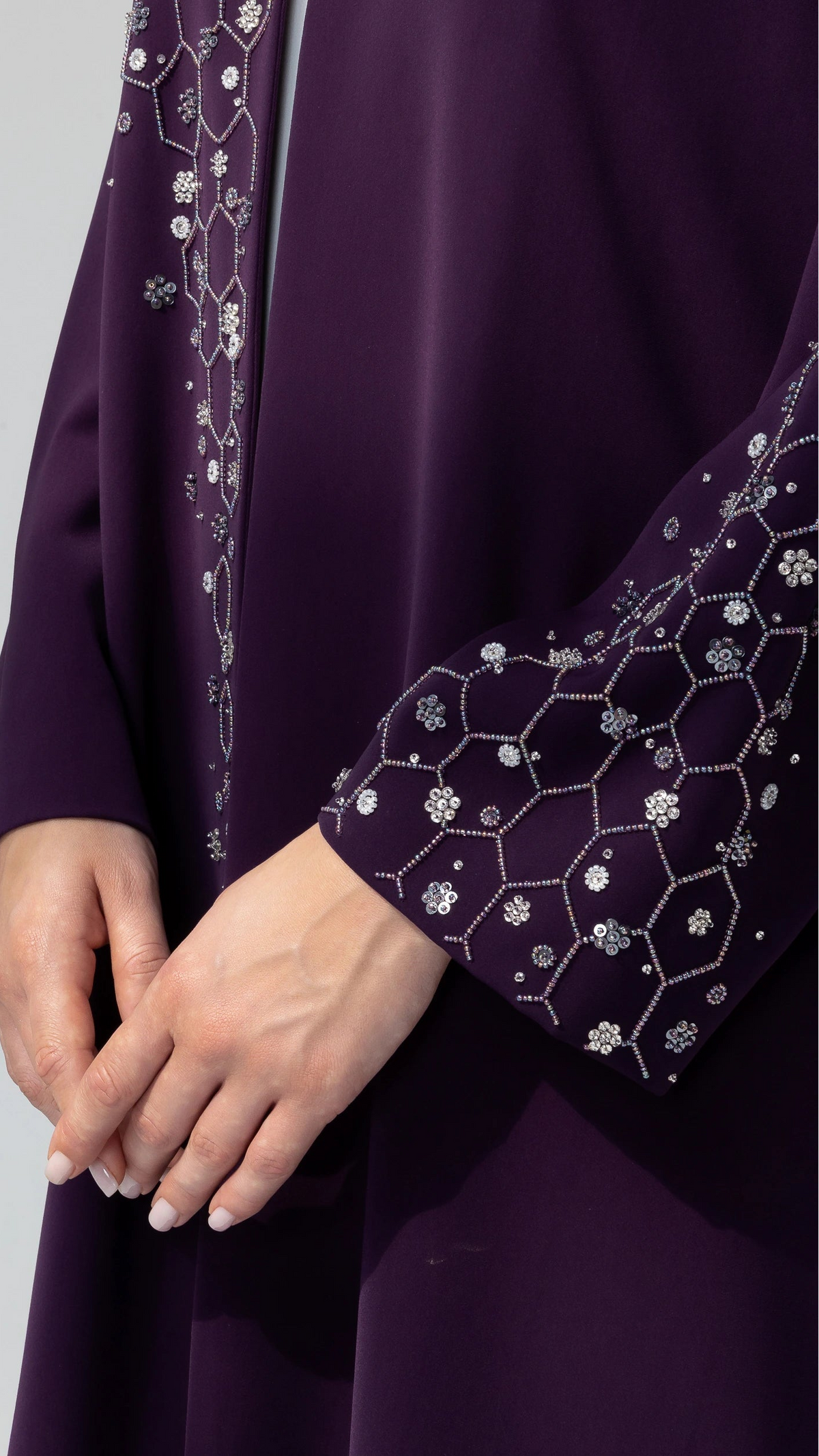 NUBAH Amethyst Mosaic abaya detailed close-up of sleeve geometric crystal embellishments on purple abaya