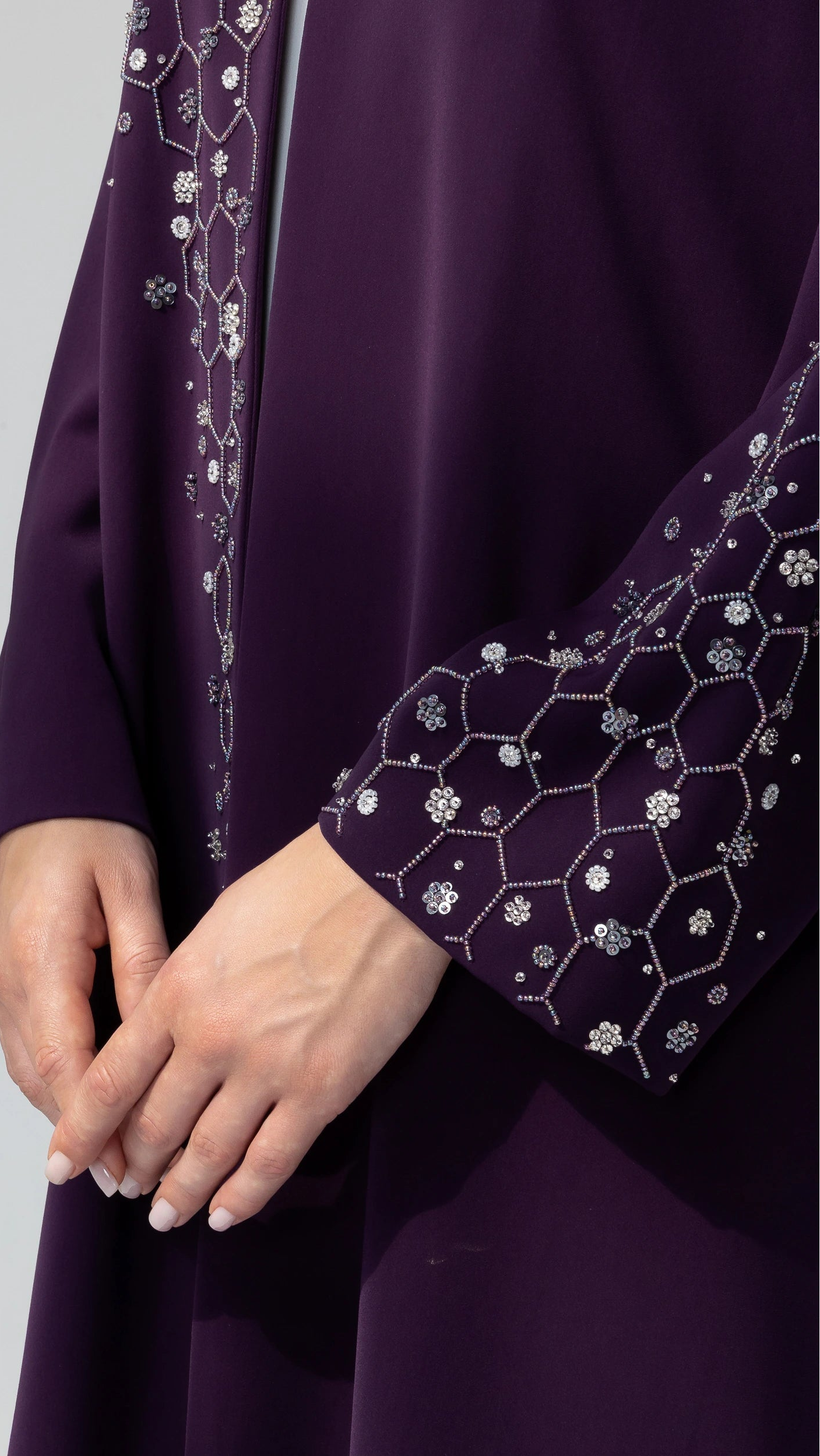 NUBAH Amethyst Mosaic abaya detailed close-up of sleeve geometric crystal embellishments on purple abaya