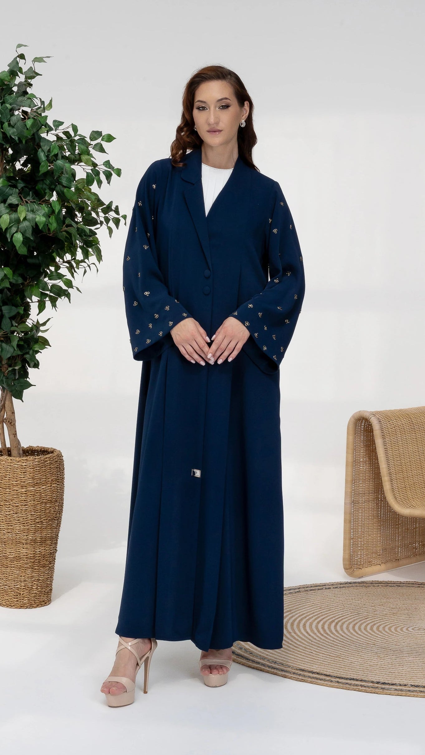 NUJUMA Midnight Luxe luxury navy abaya portrait with elegant structured lapel detailing