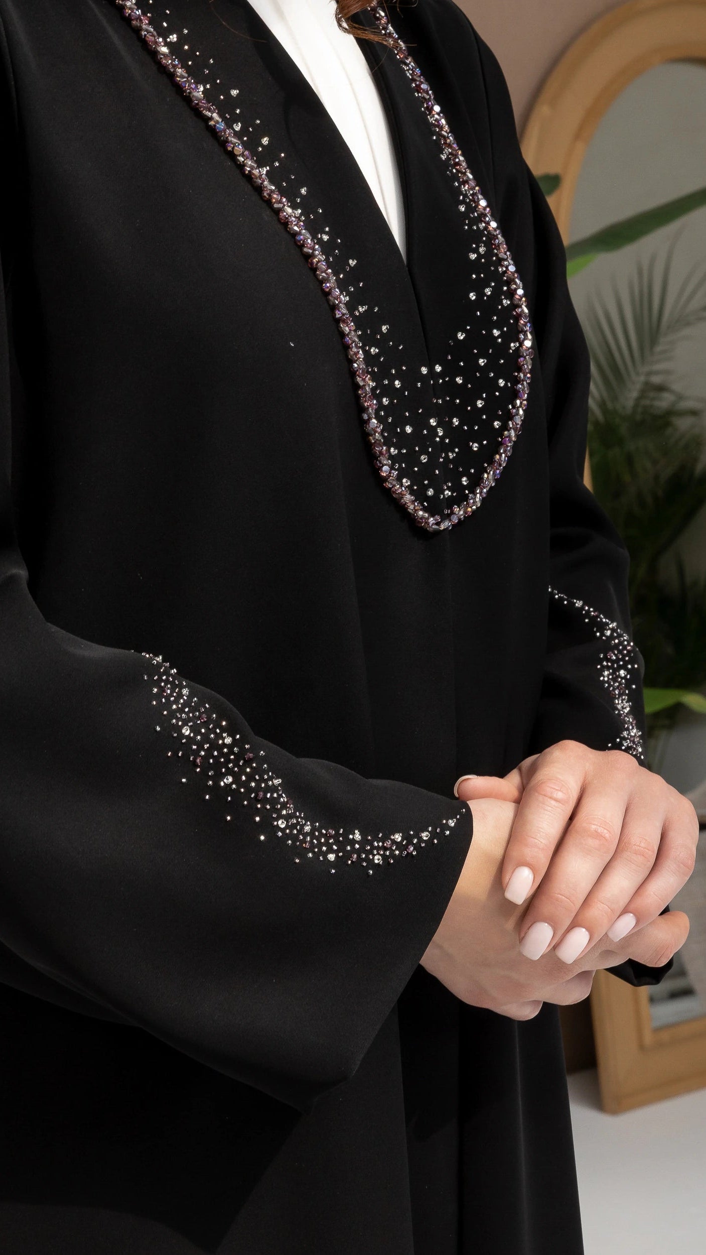 Nuhaylah Noir Eclat black luxury abaya Close-up of crystal detailing on neckline and sleeves