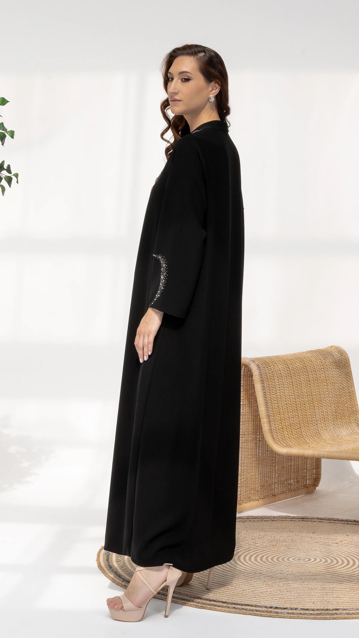 Nuhaylah Noir Eclat black luxury abaya couture side profile showcasing fluid drape and structure