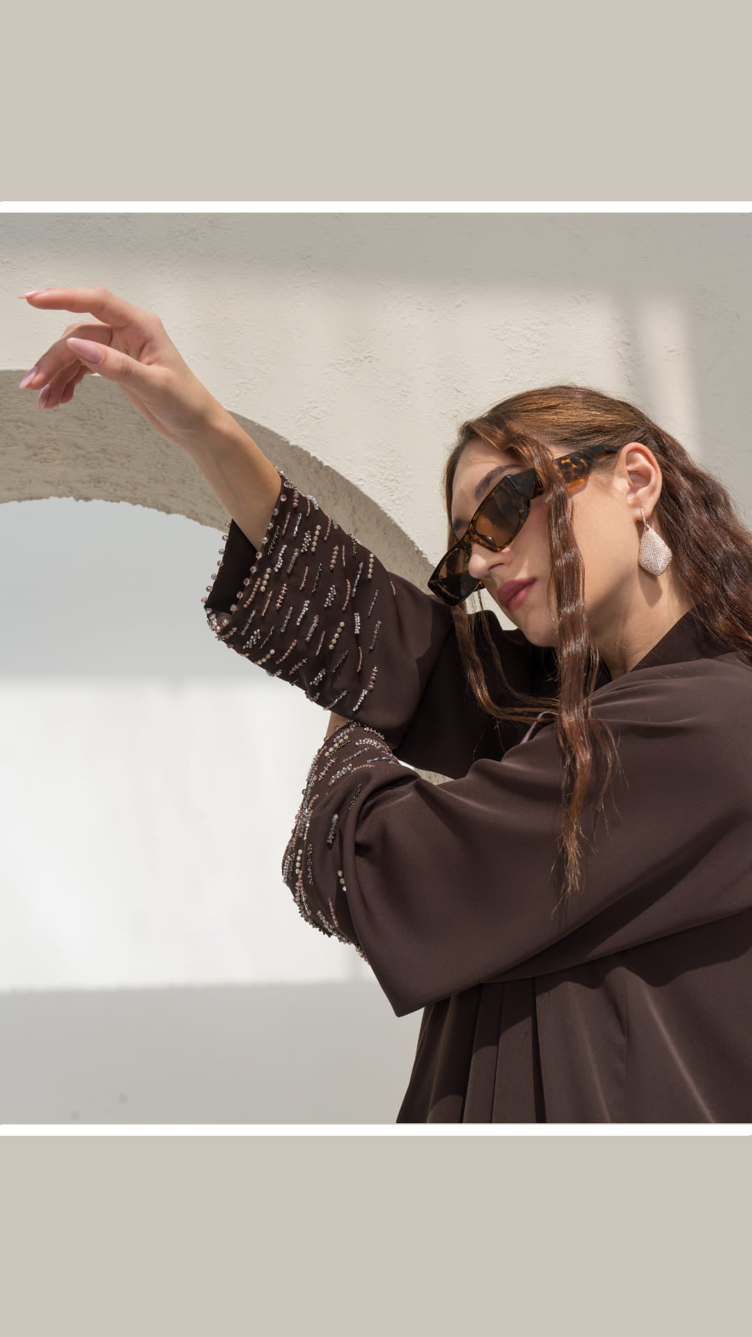 RANYA | Cocoa Crystal Rain Detailed cuff shot showing crystal embellishments on brown abaya sleeve 