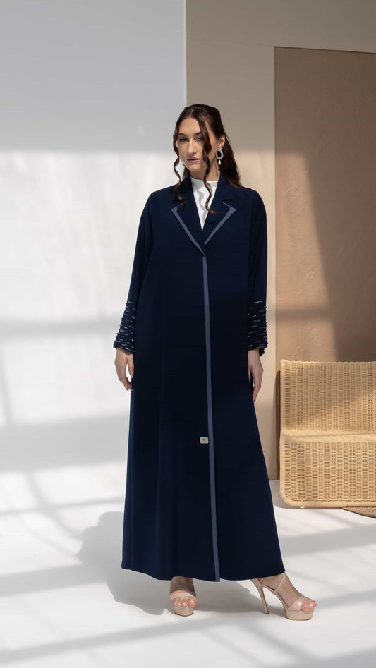 RANYA | Midnight Crystal Rain Navy luxury abaya with mauve inner dress and linear crystal beadwork sleeves front view