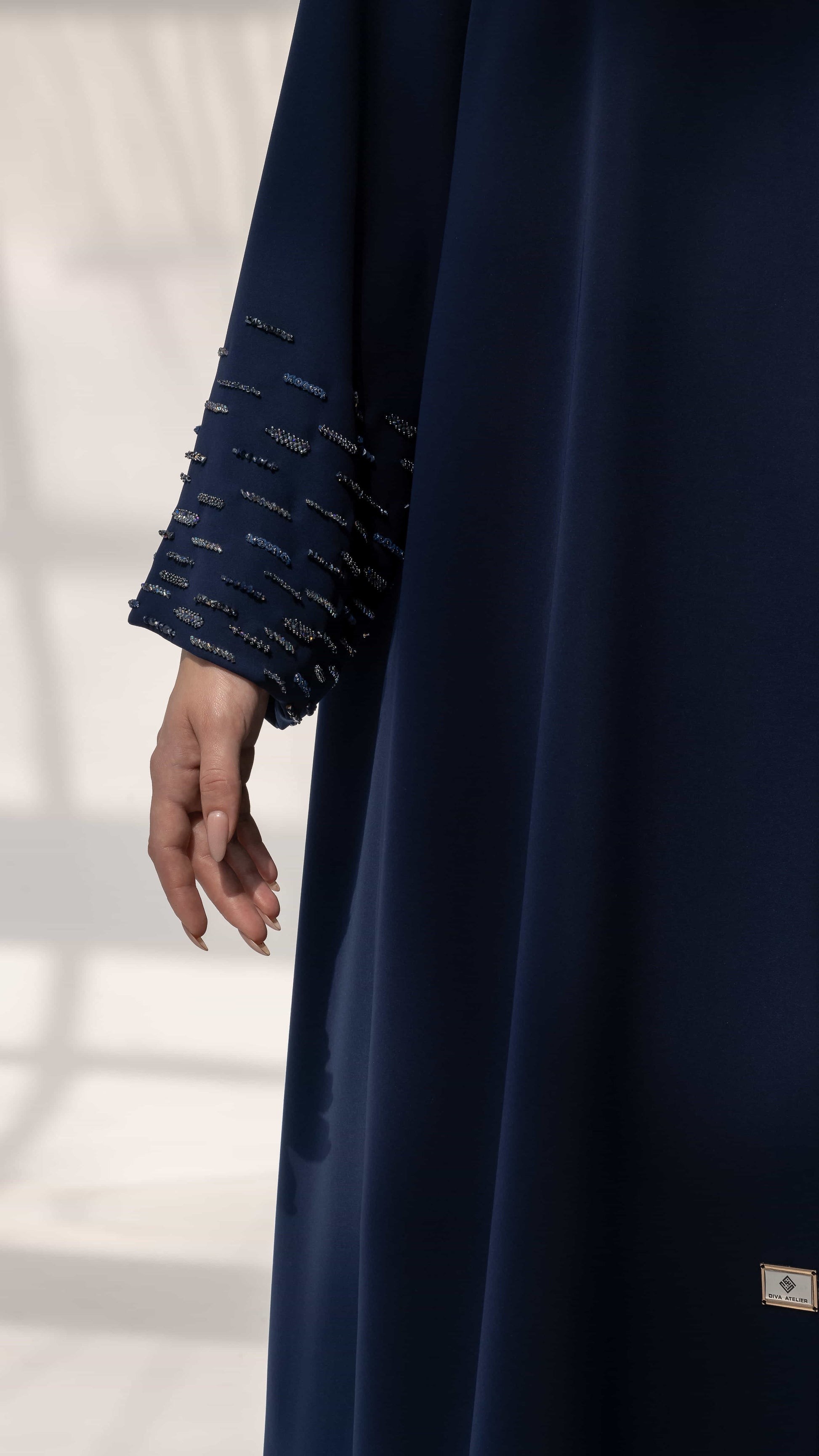 RANYA | Midnight Crystal Rain Detailed cuff shot showing crystal embellishments on navy abaya sleeve
